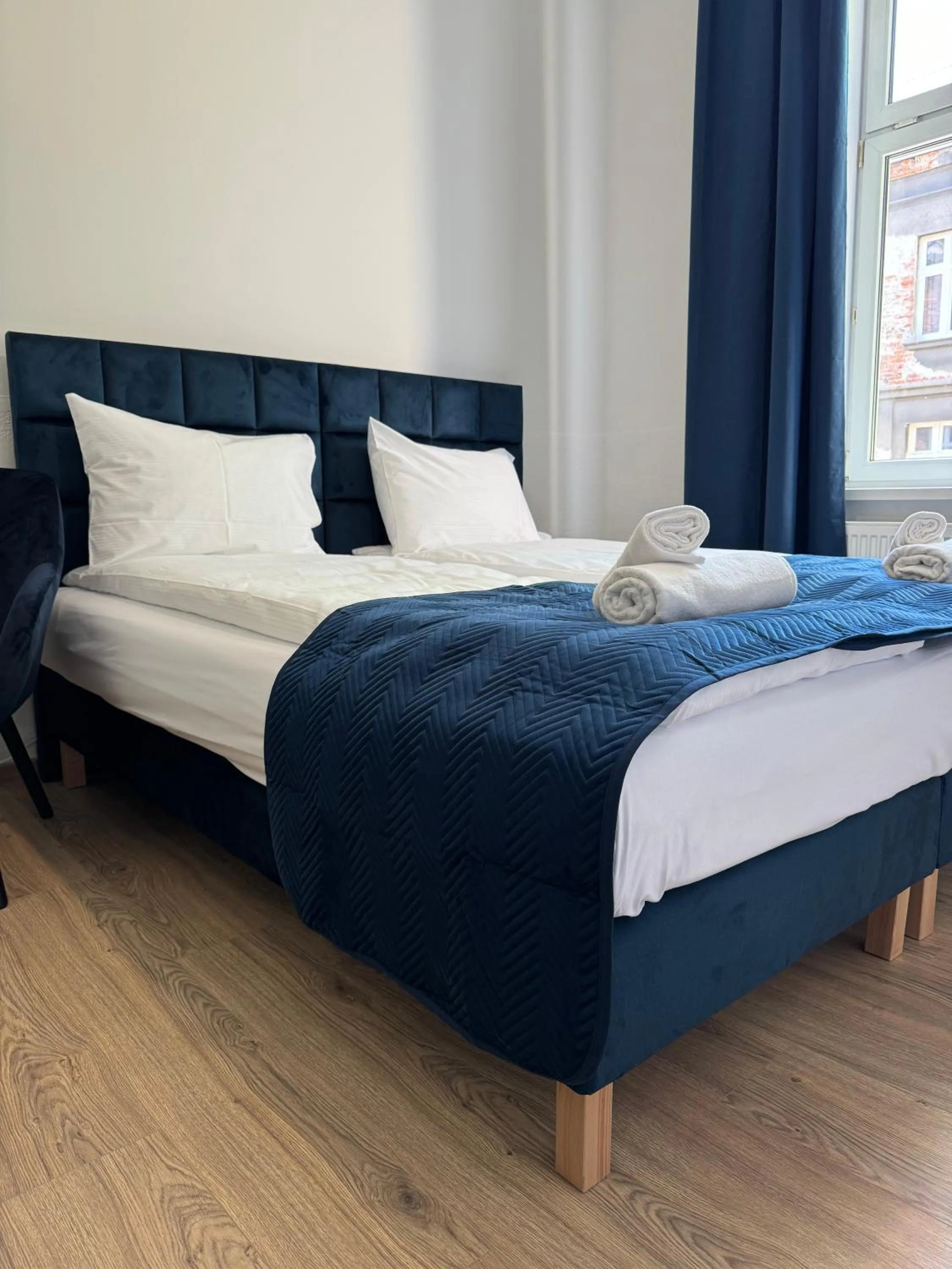 Bed in IRIS Aparthotel