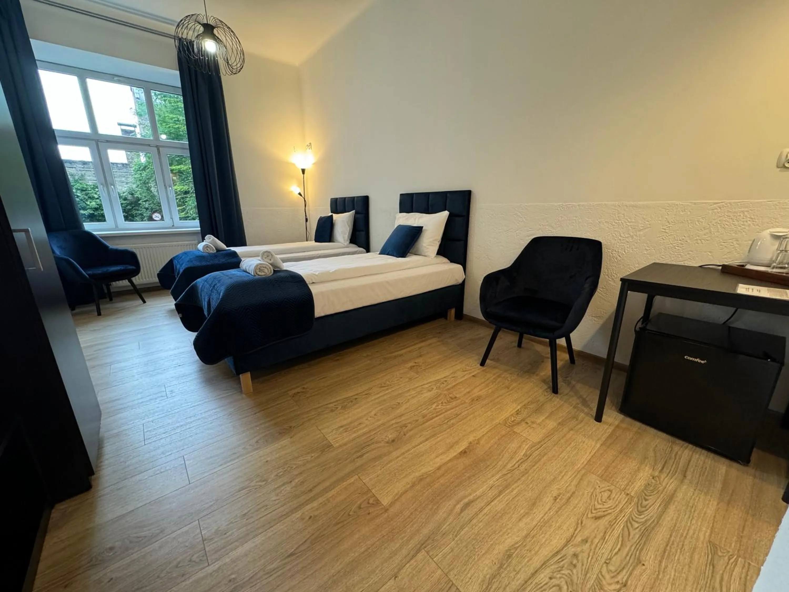 Bed in IRIS Aparthotel