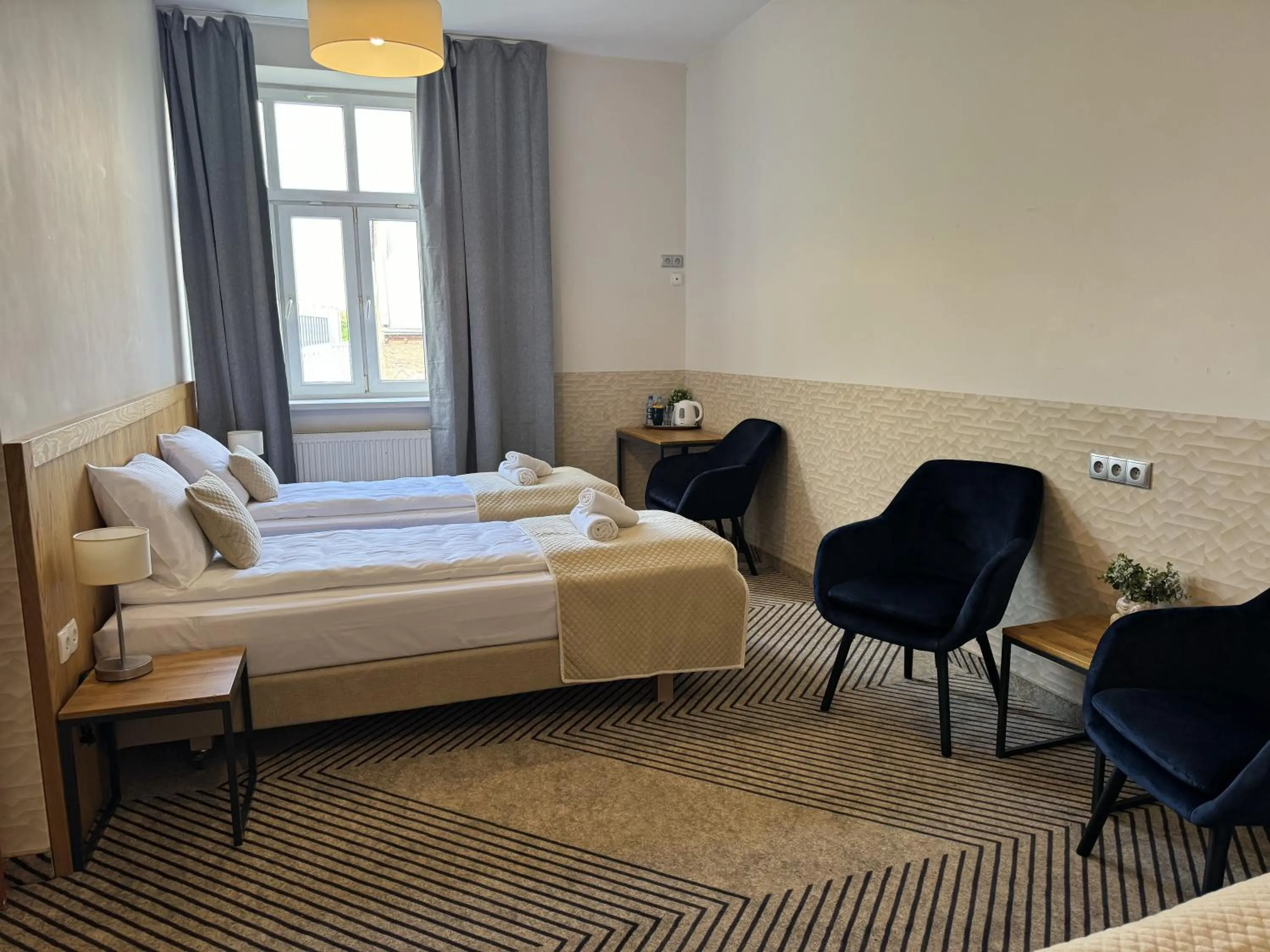 Bed in IRIS Aparthotel