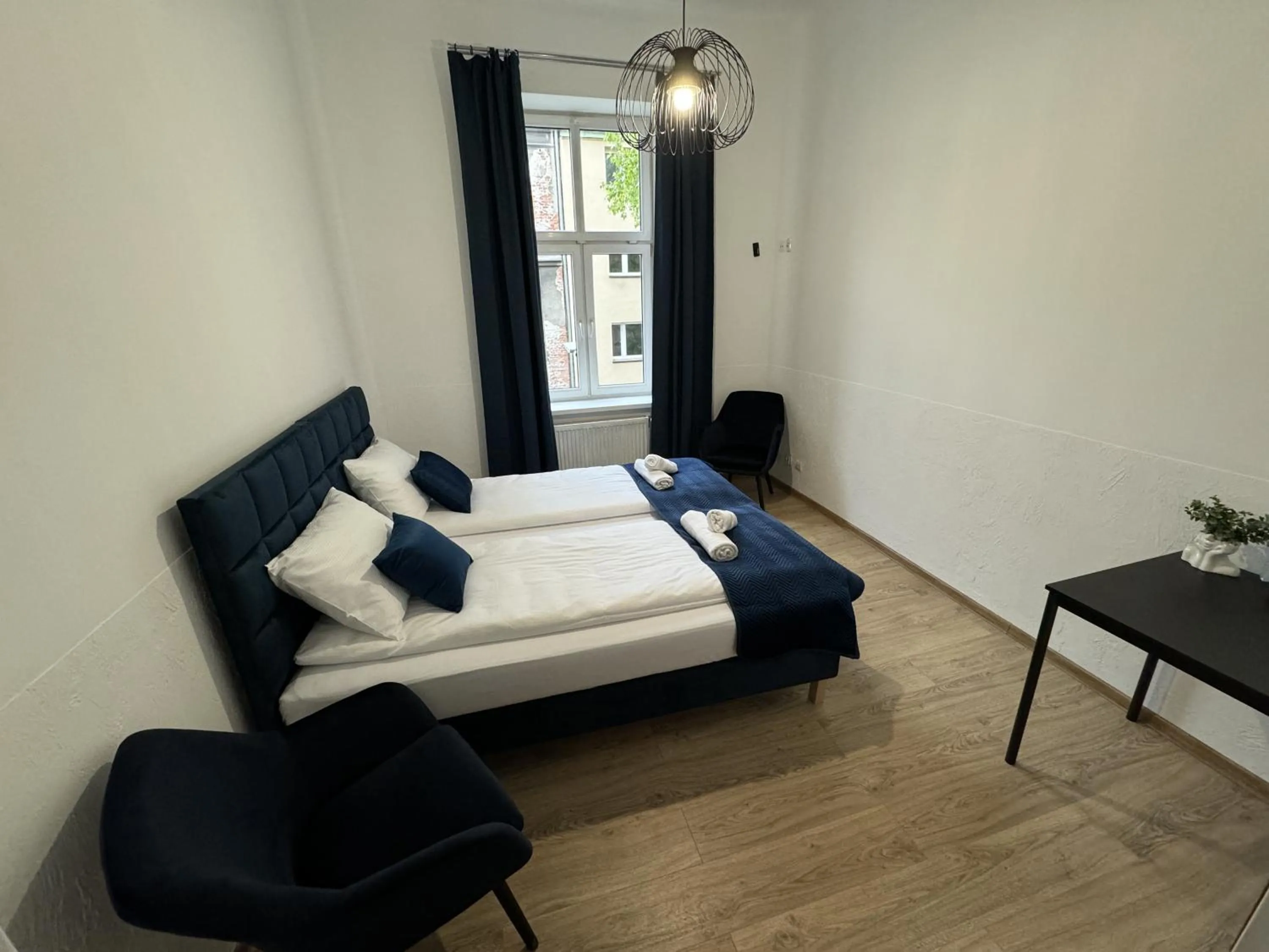 Bed in IRIS Aparthotel