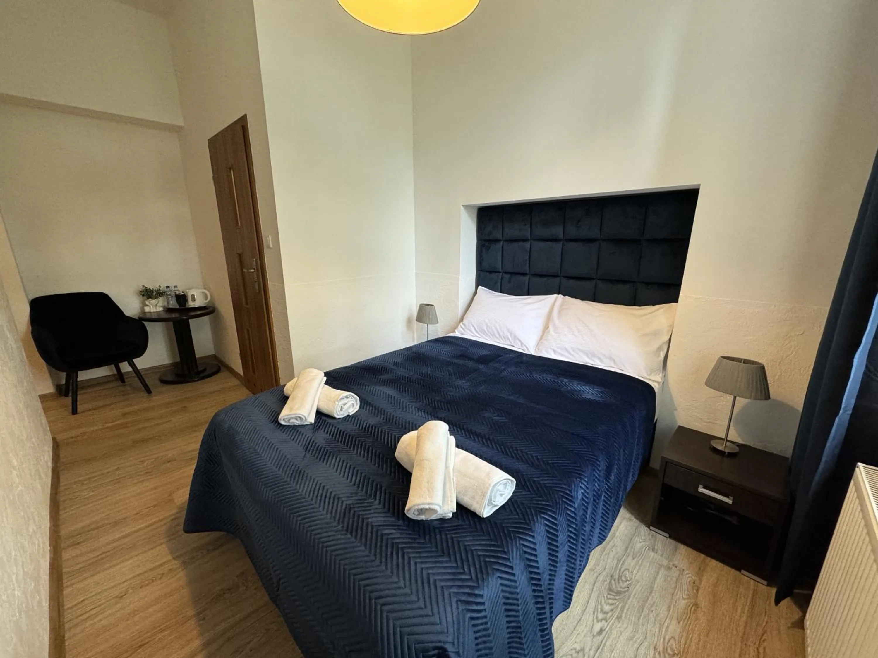 Bed in IRIS Aparthotel