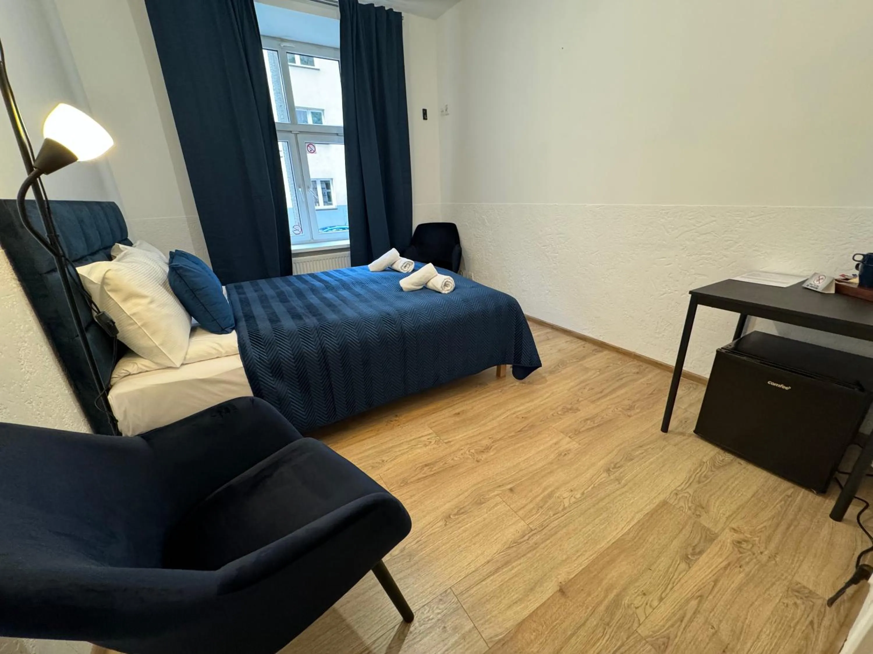 Bed in IRIS Aparthotel