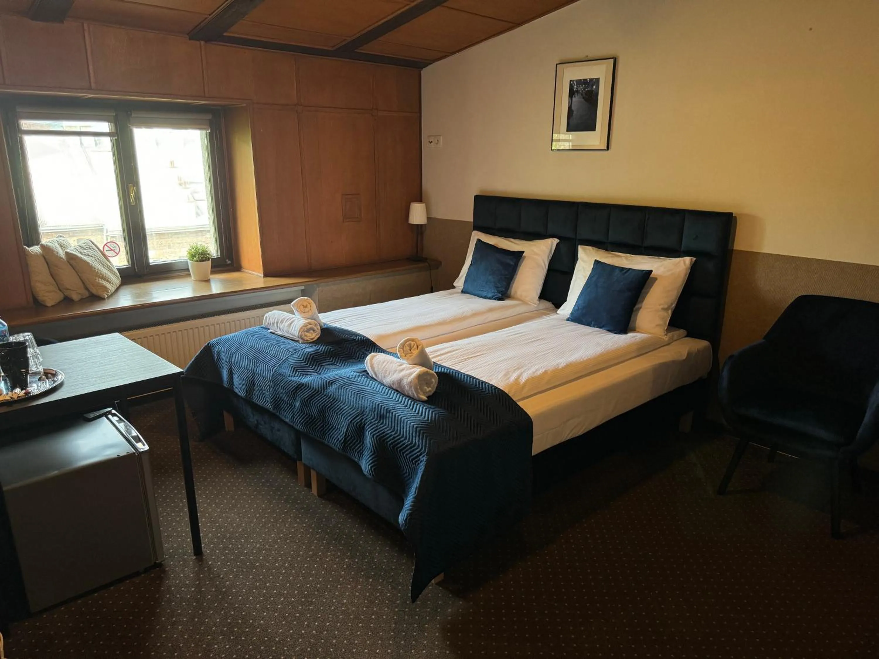 Bed in IRIS Aparthotel