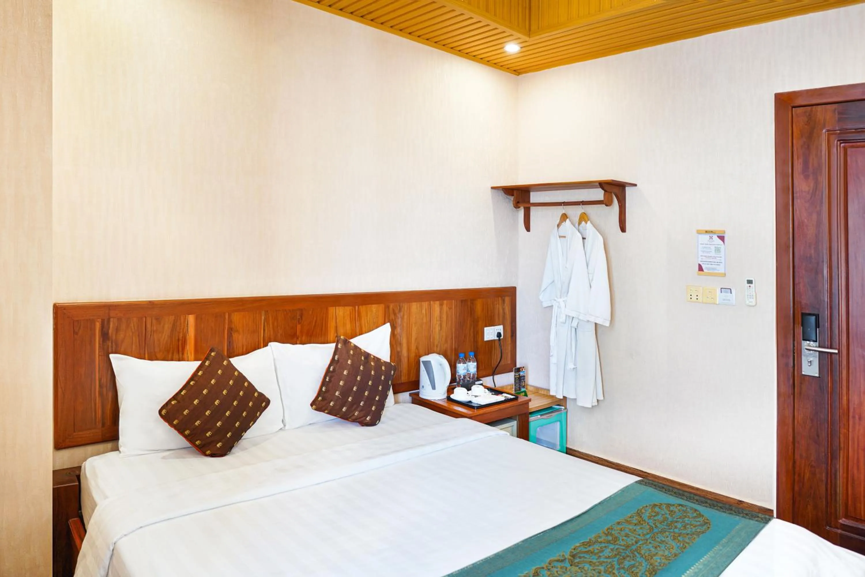 Bed in Phuminh Hotel Riverside