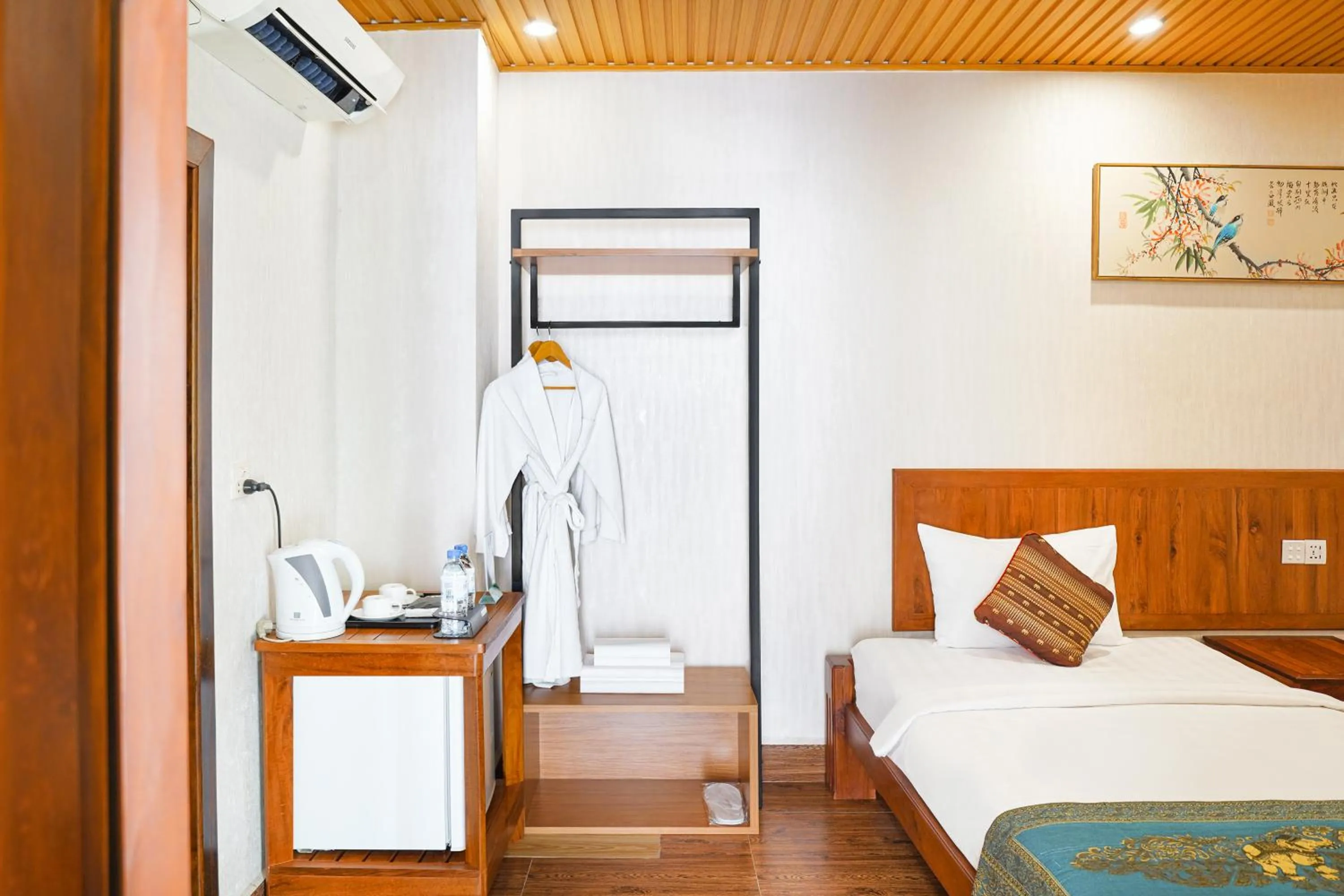 Bed in Phuminh Hotel Riverside