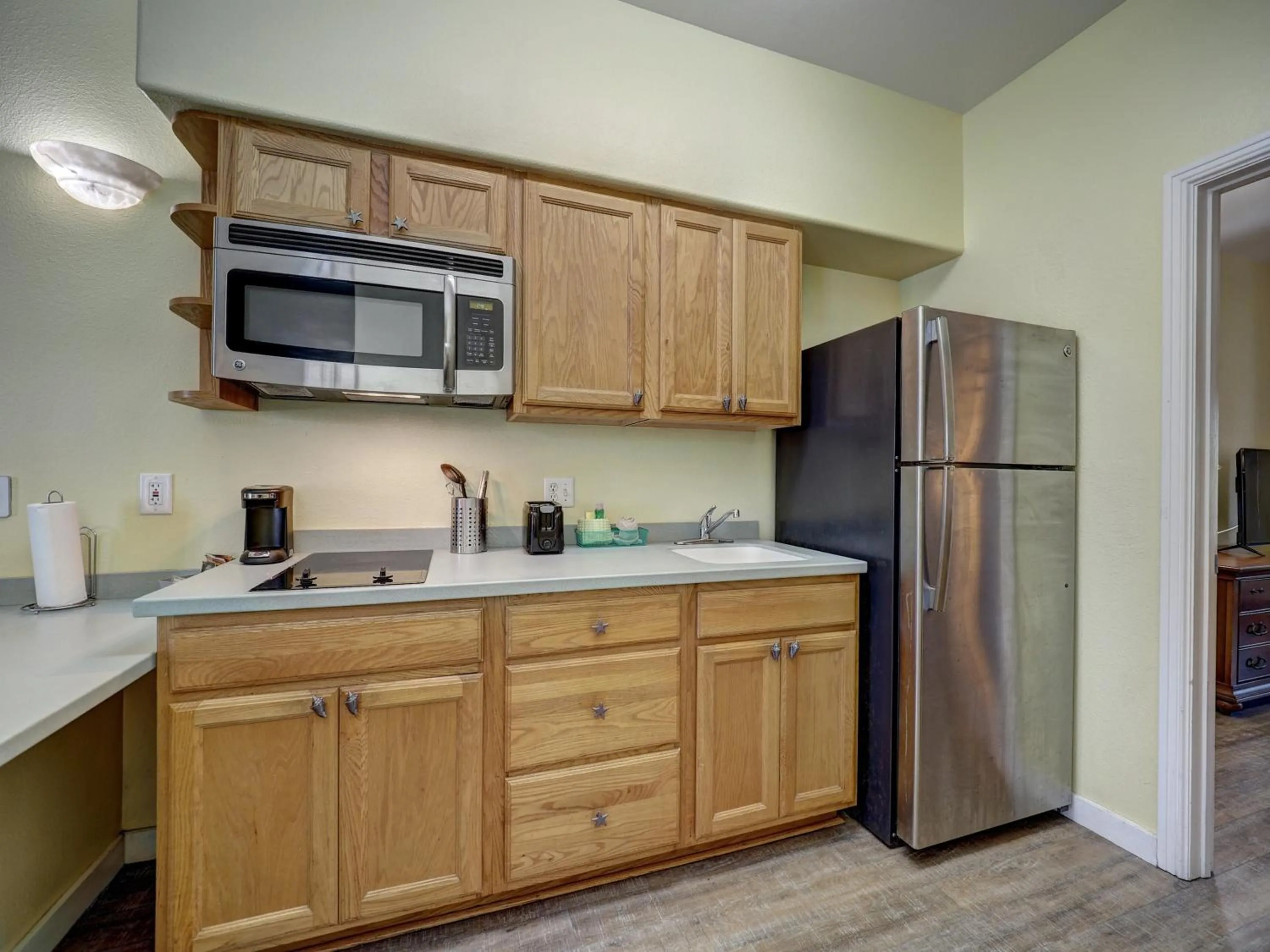 Kitchen or kitchenette in Seashell Village Resort near the beach with kitchens