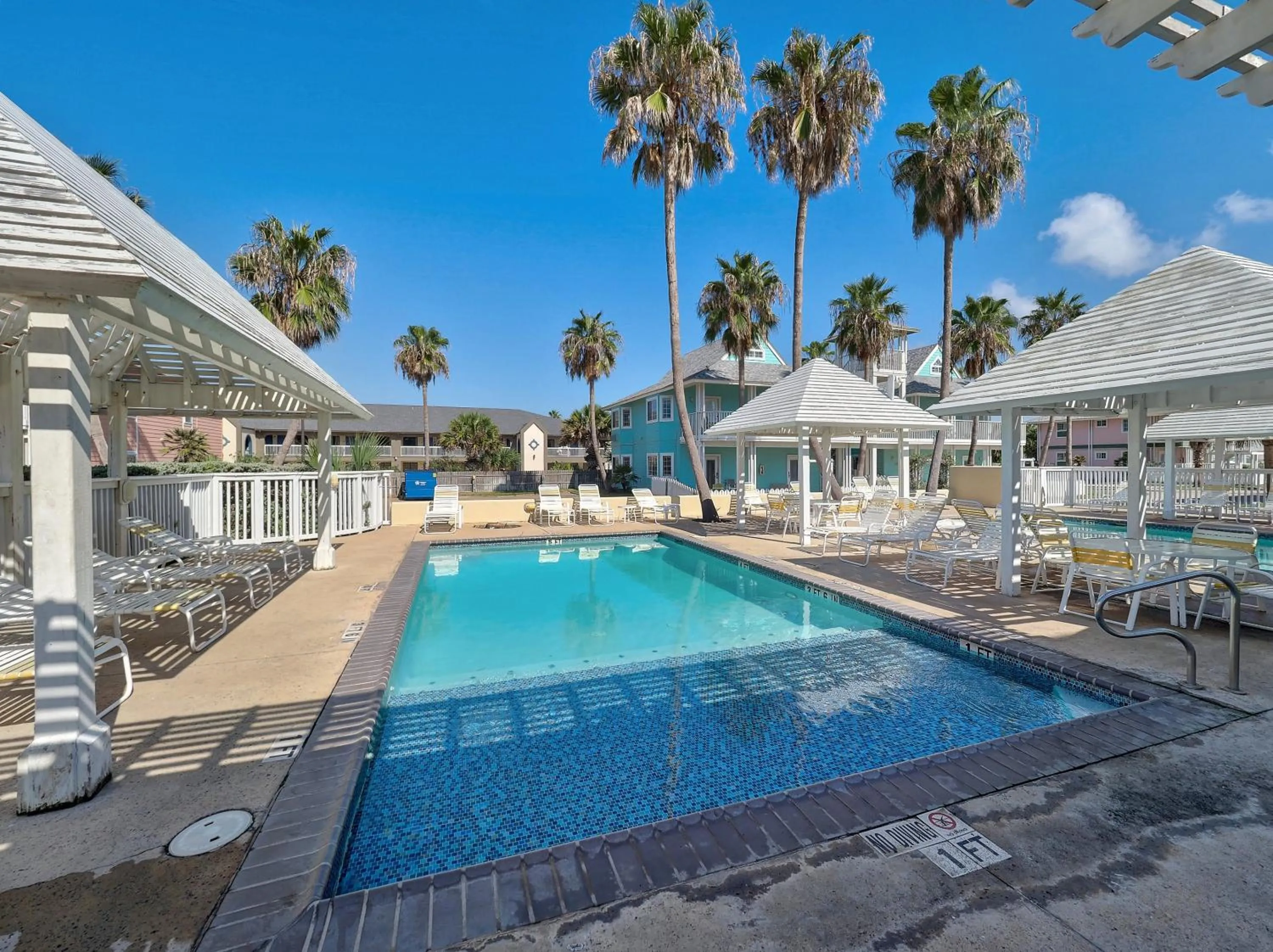 Swimming pool in Seashell Village Resort near the beach with kitchens