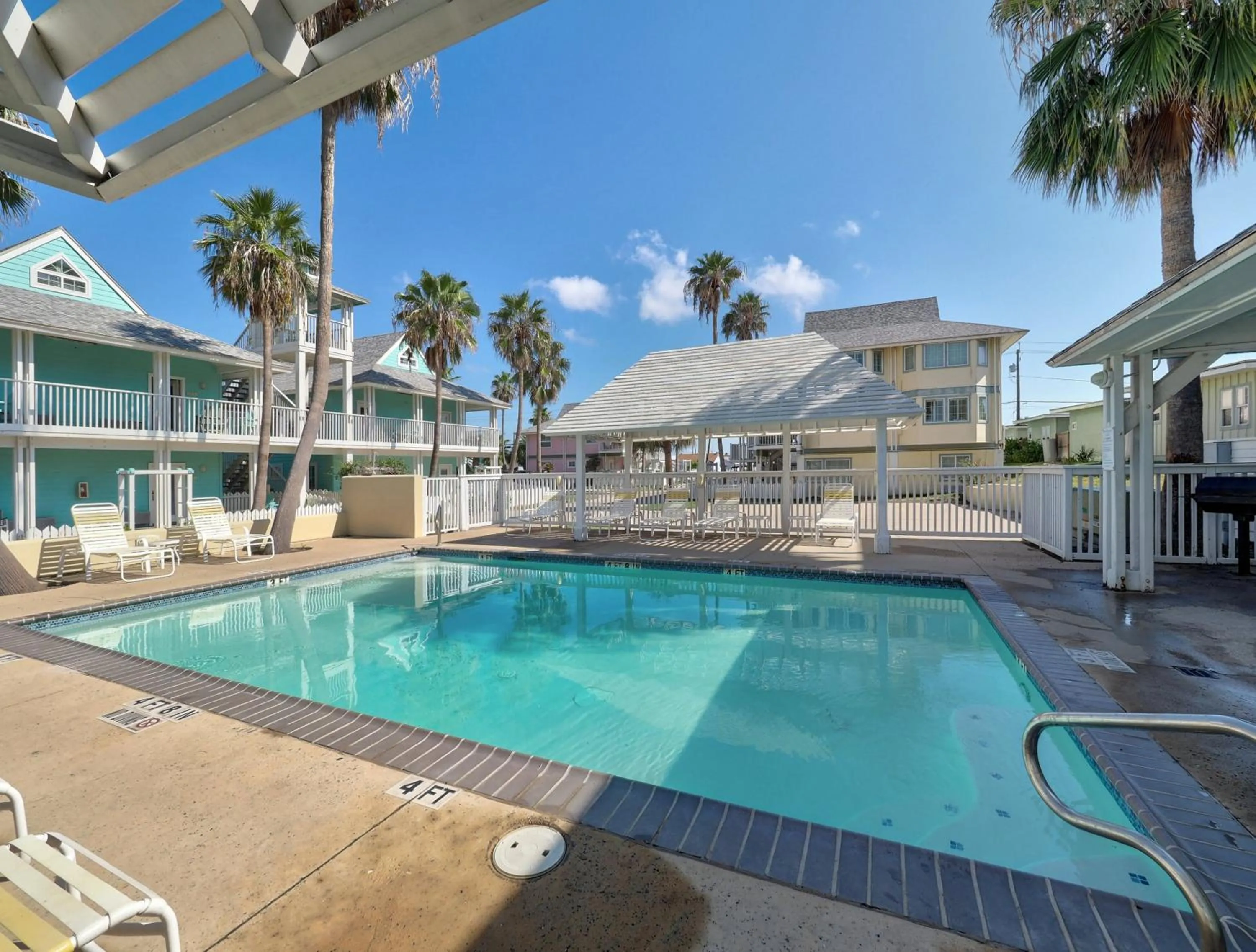 Swimming pool in Seashell Village Resort near the beach with kitchens