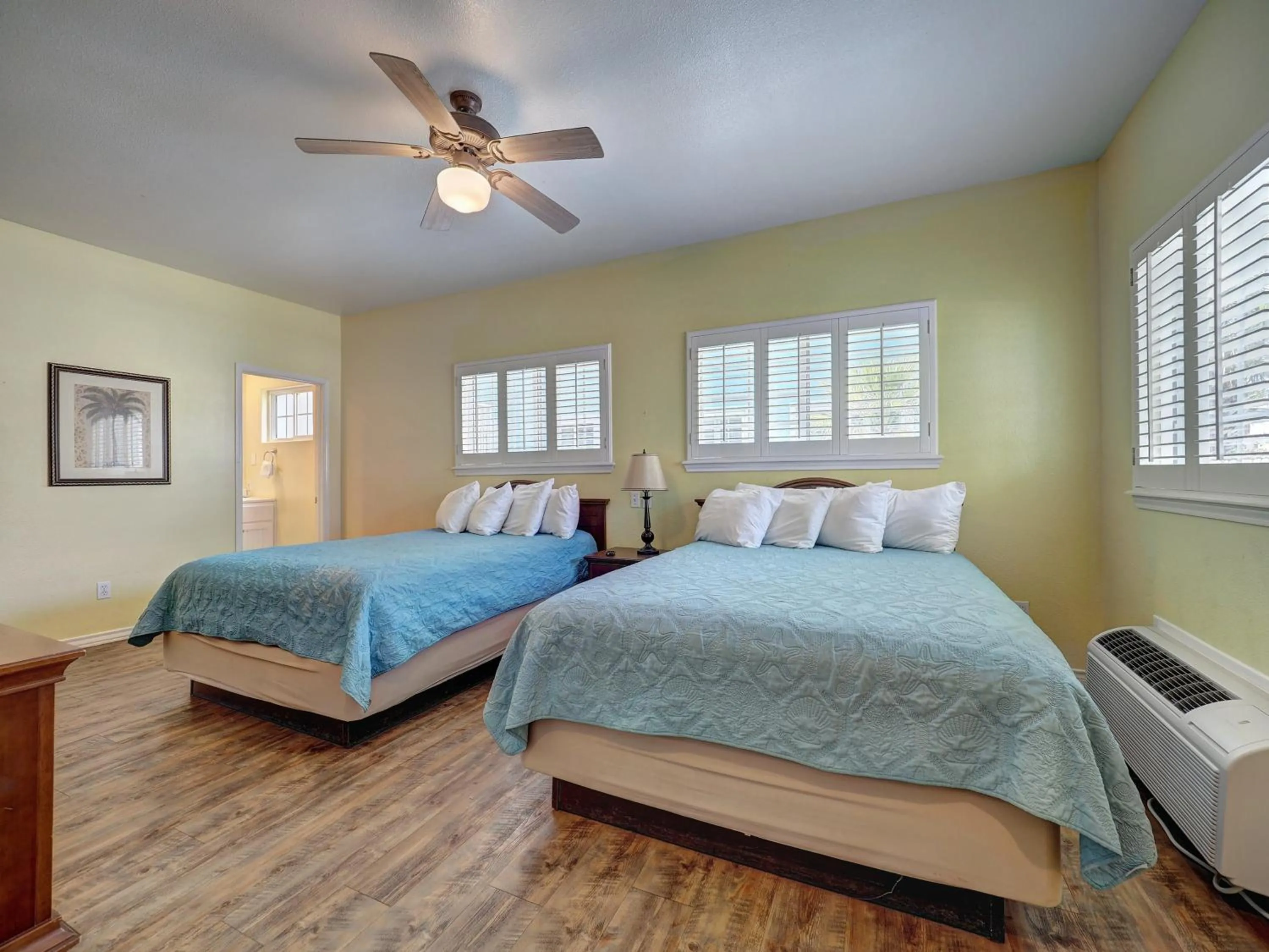 Bed in Seashell Village Resort near the beach with kitchens