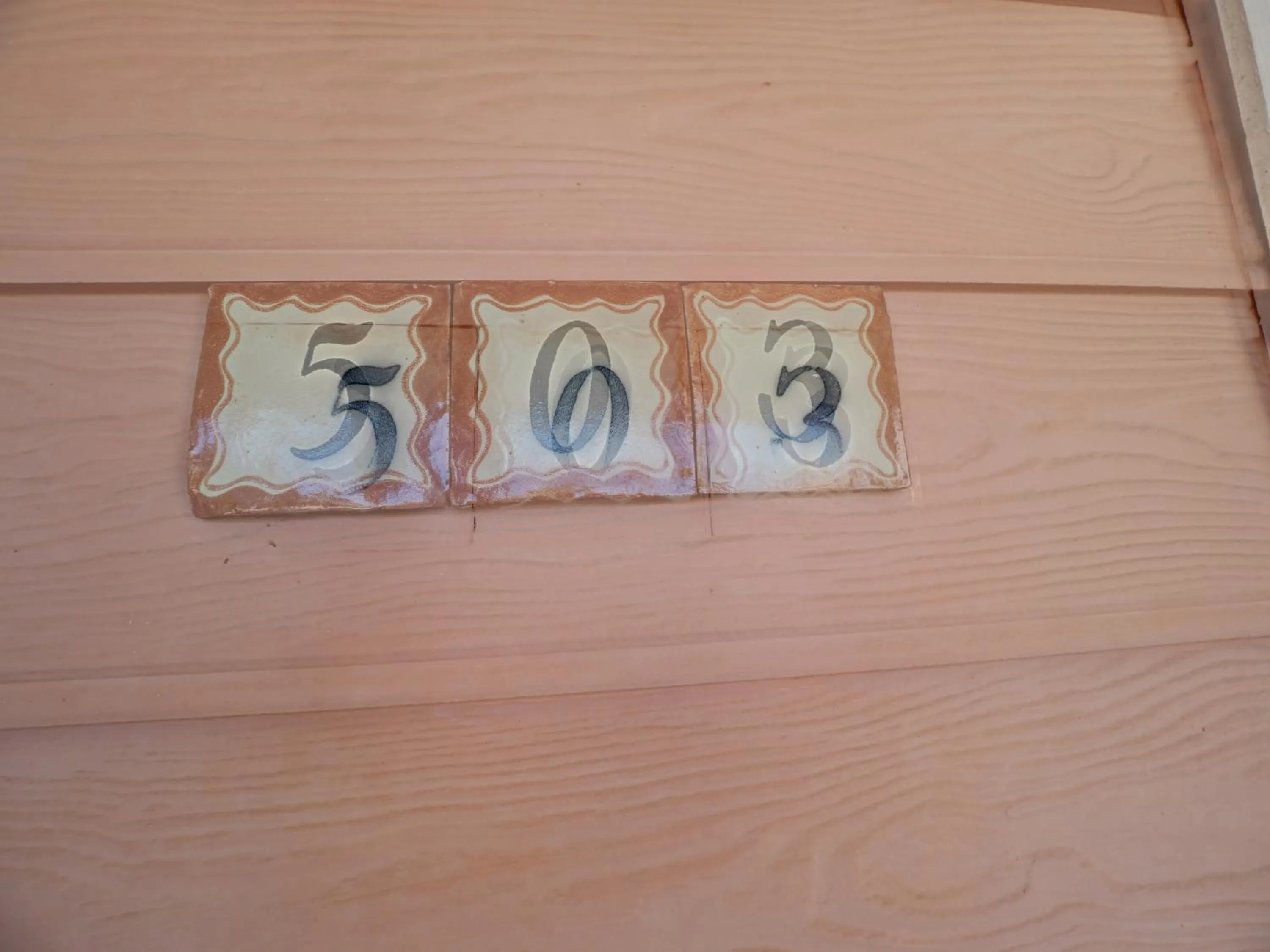 Logo/Certificate/Sign in Seashell Village Resort near the beach with kitchens