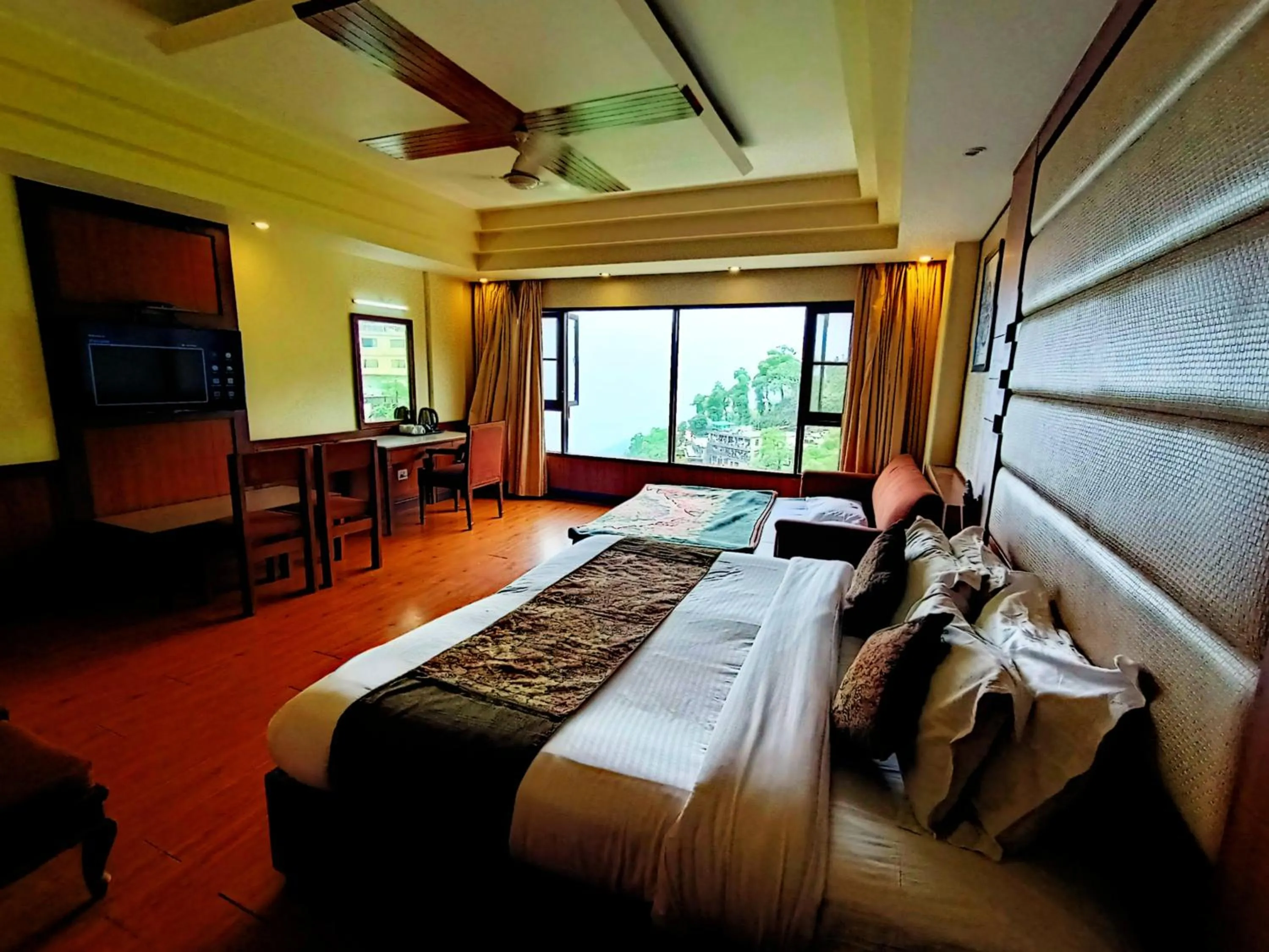 Bed in Hotel Vishnu Palace