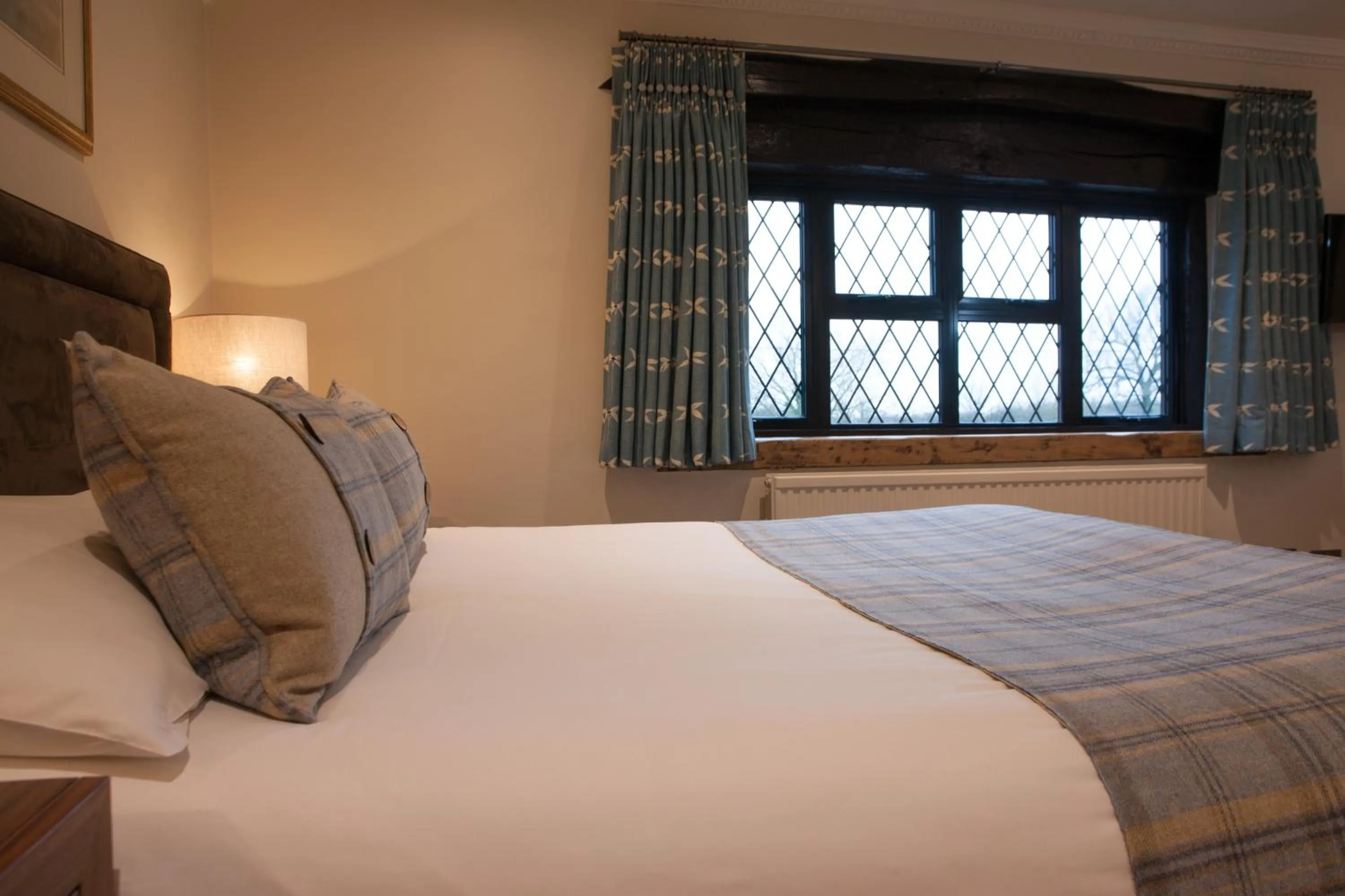 Bed in Stirrups Hotel