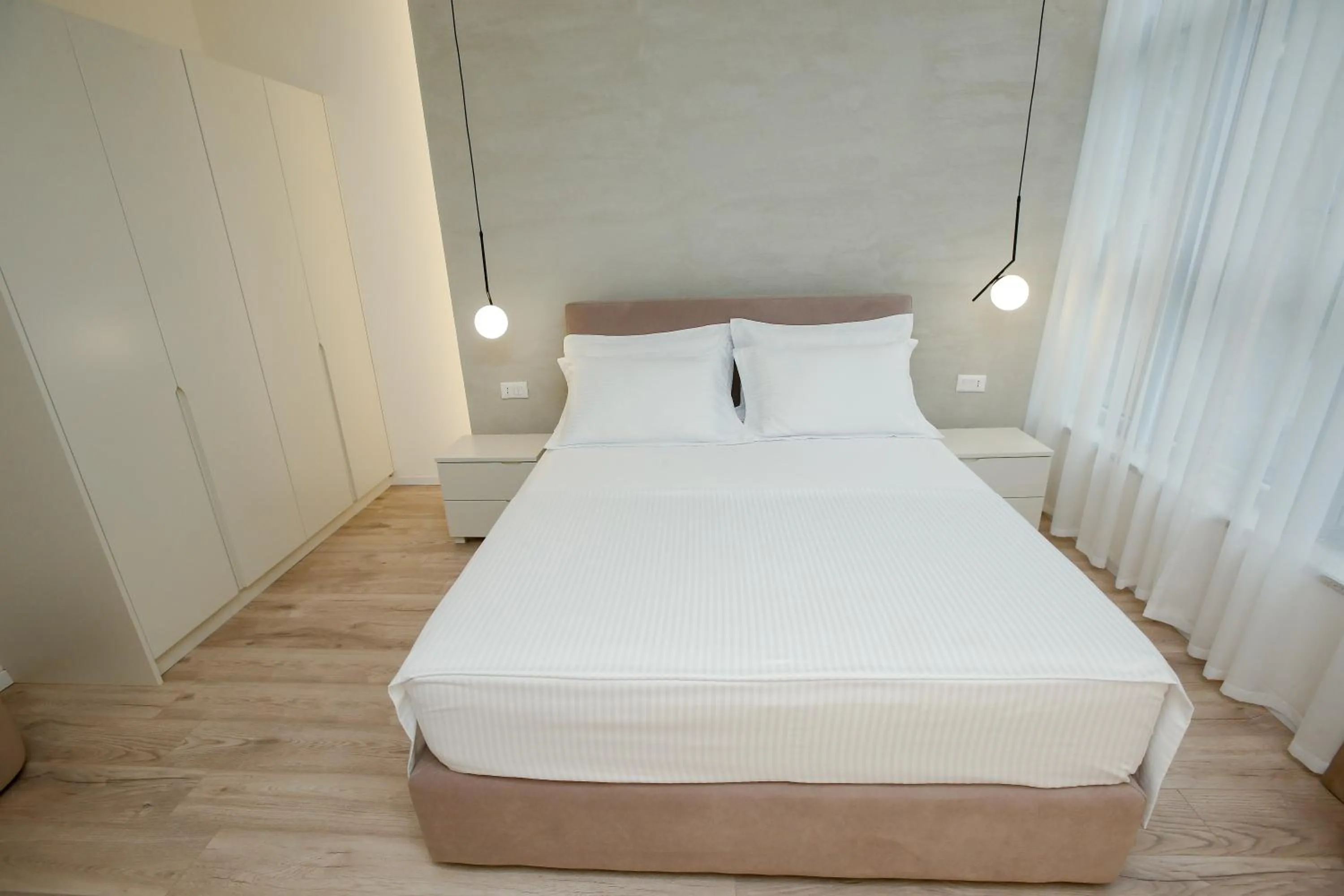 Bed in NÓS Luxury Rooms Shkoder