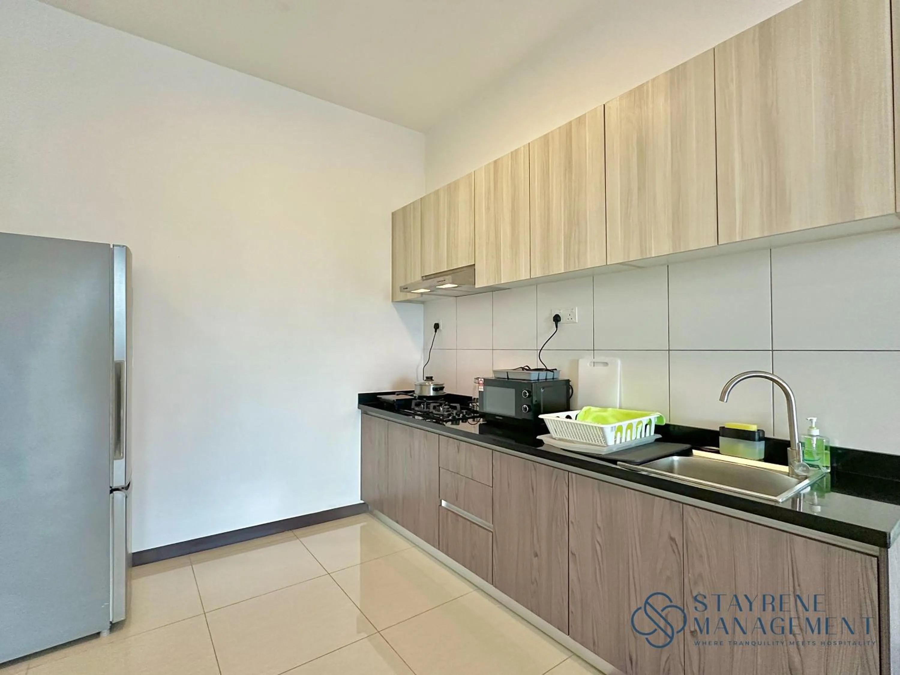 Kitchen or kitchenette in Molek Regency By Stayrene