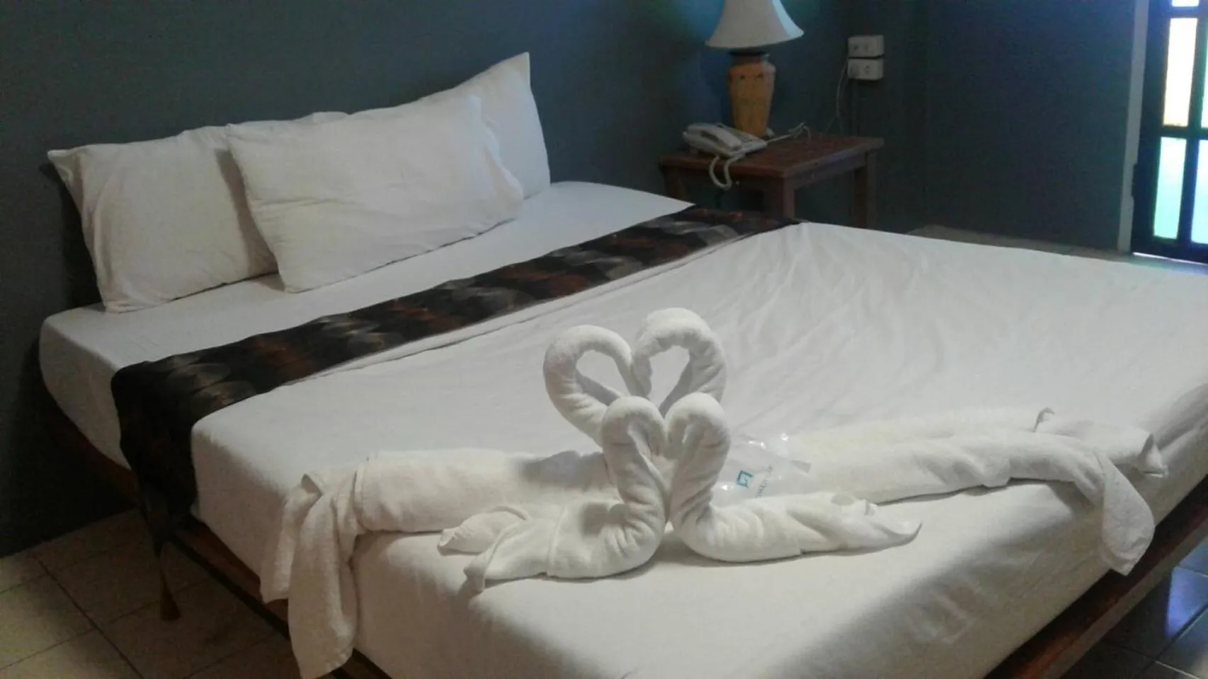 Bed in Bangkok Travel Suites Hotel