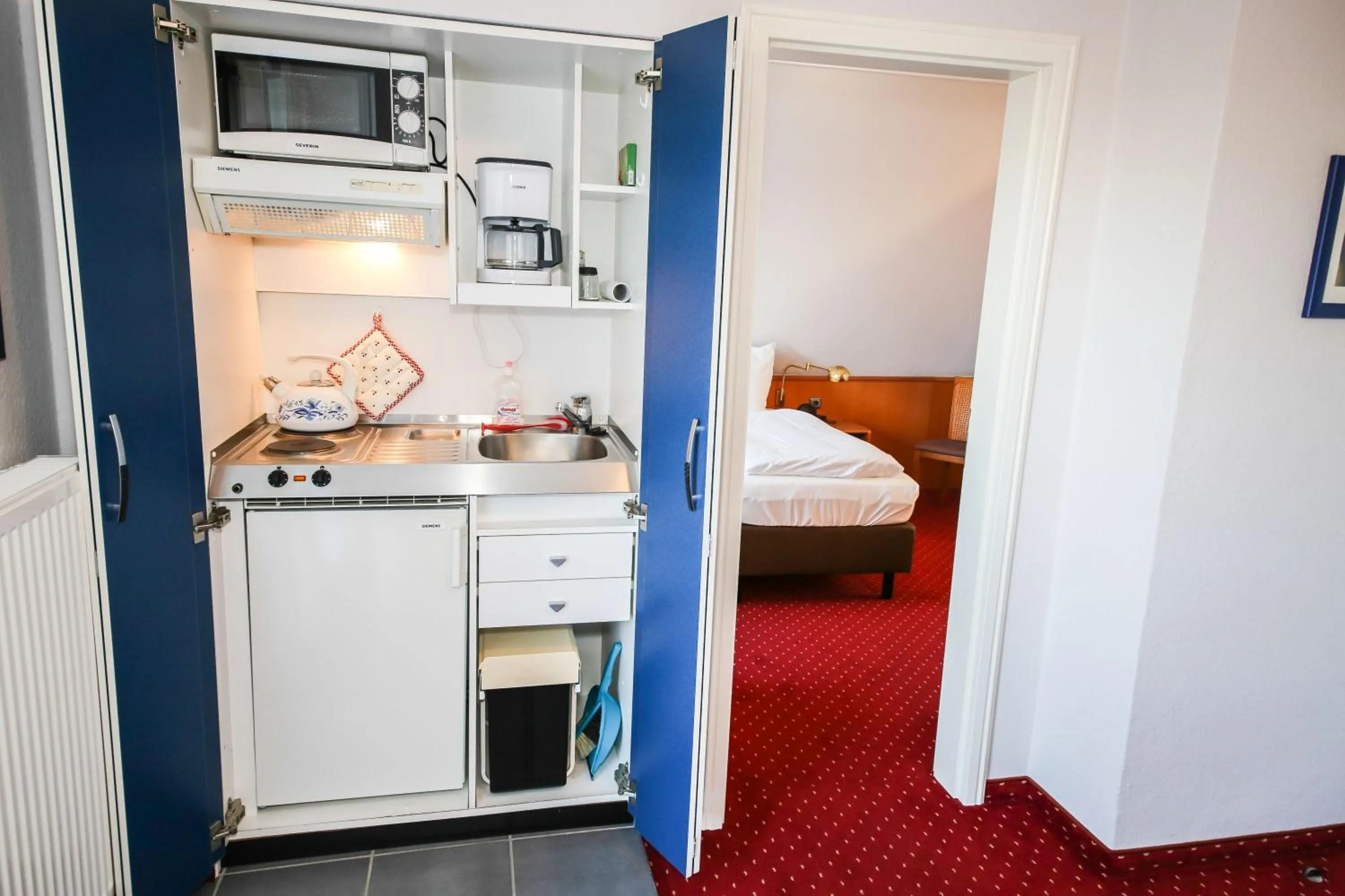 Kitchen or kitchenette, Bed in 3C-Appartements