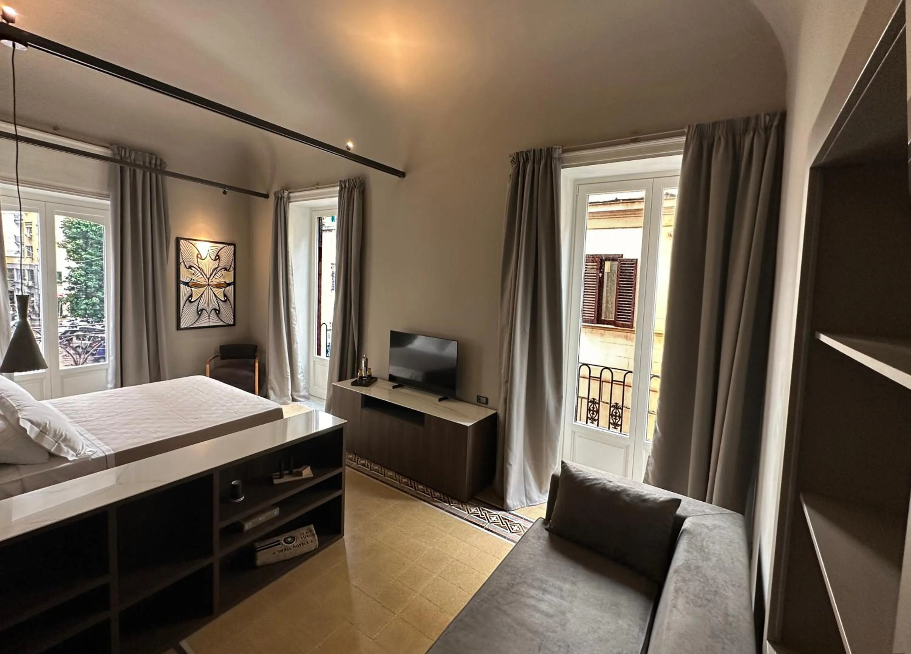 Photo of the whole room, Bed in Palazzo Liberty Unique Hotel by Geocharme