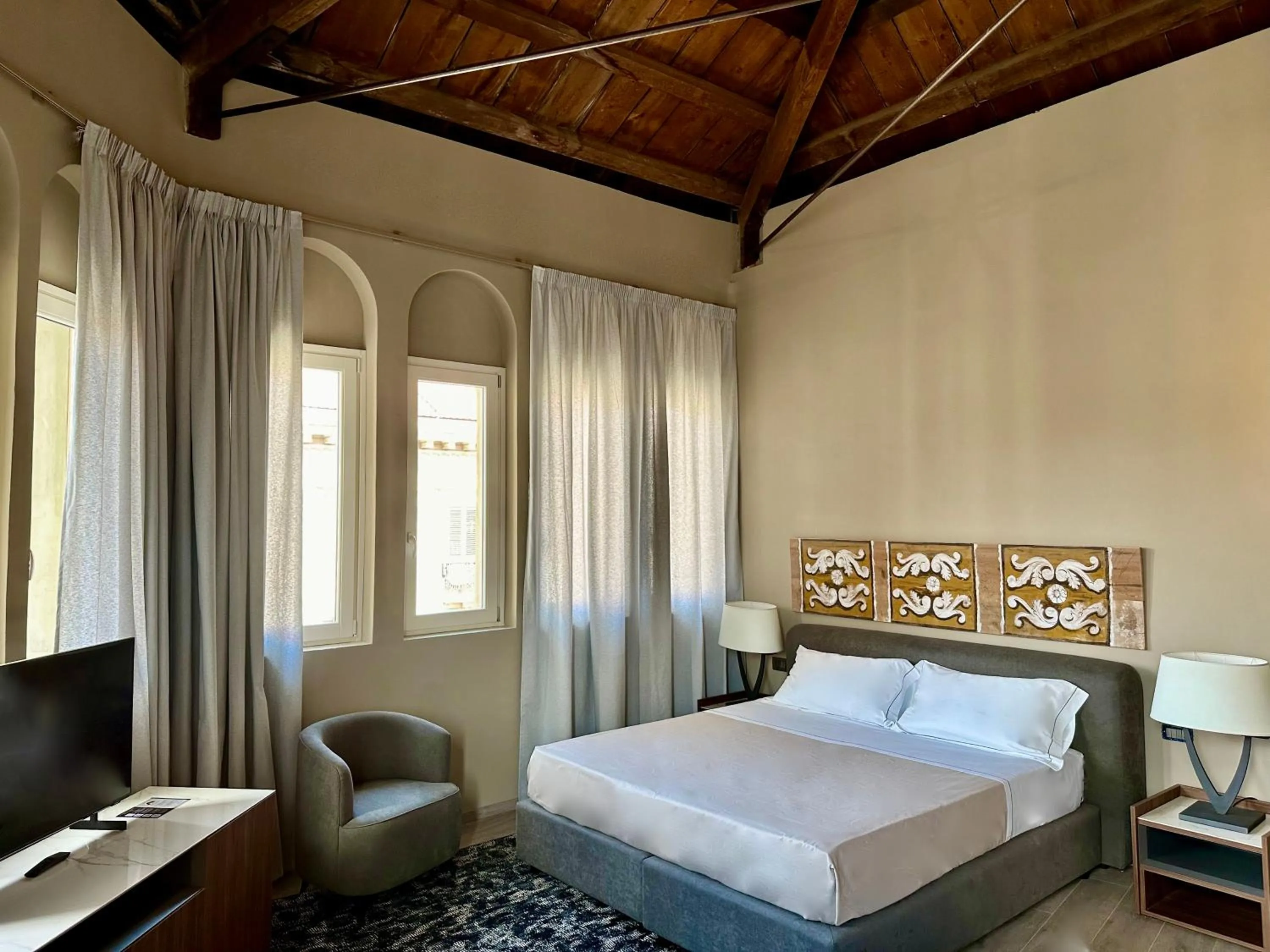 Bedroom, Bed in Palazzo Liberty Unique Hotel by Geocharme