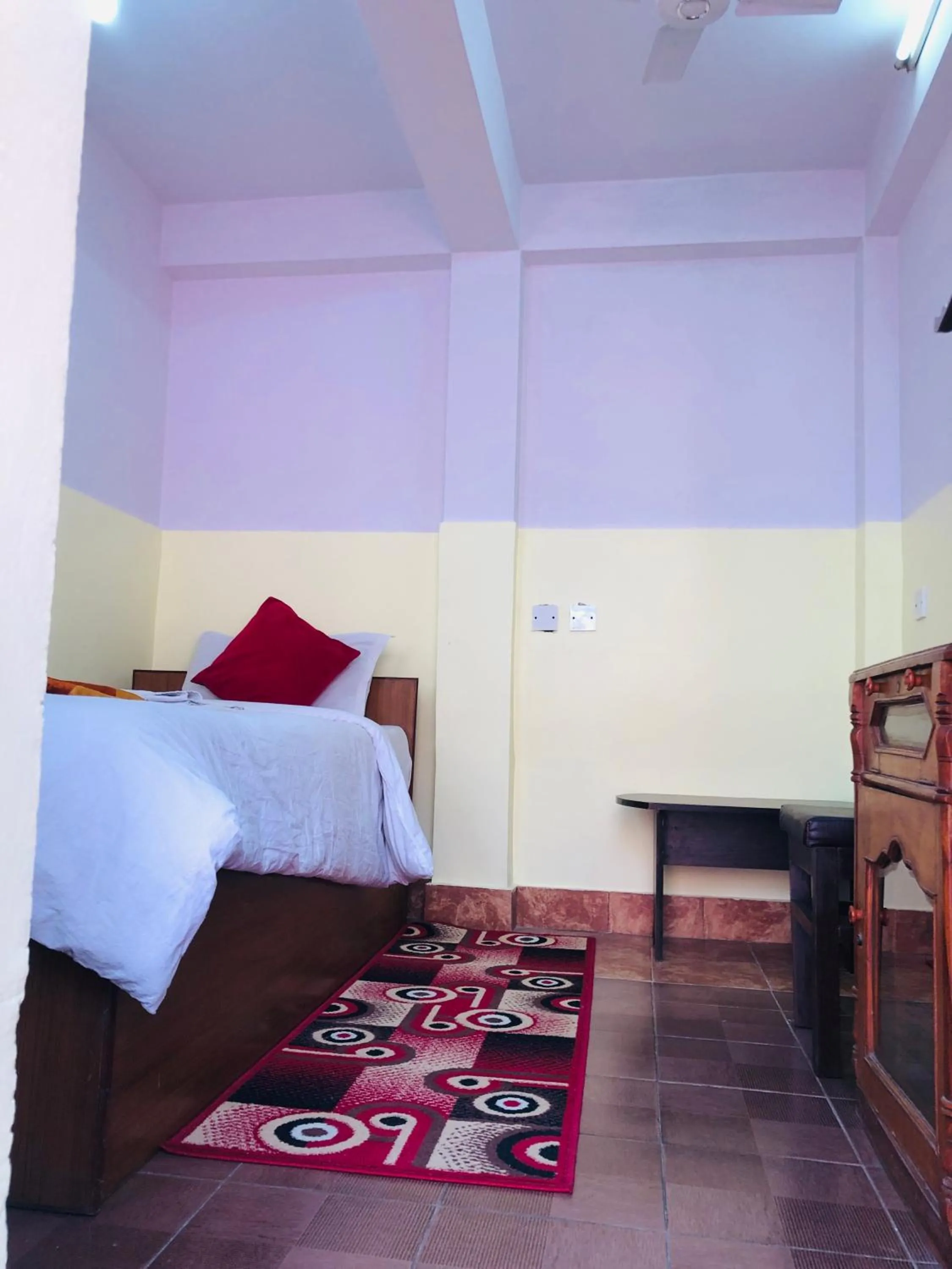 Bed in Yeti Cozy Hotel