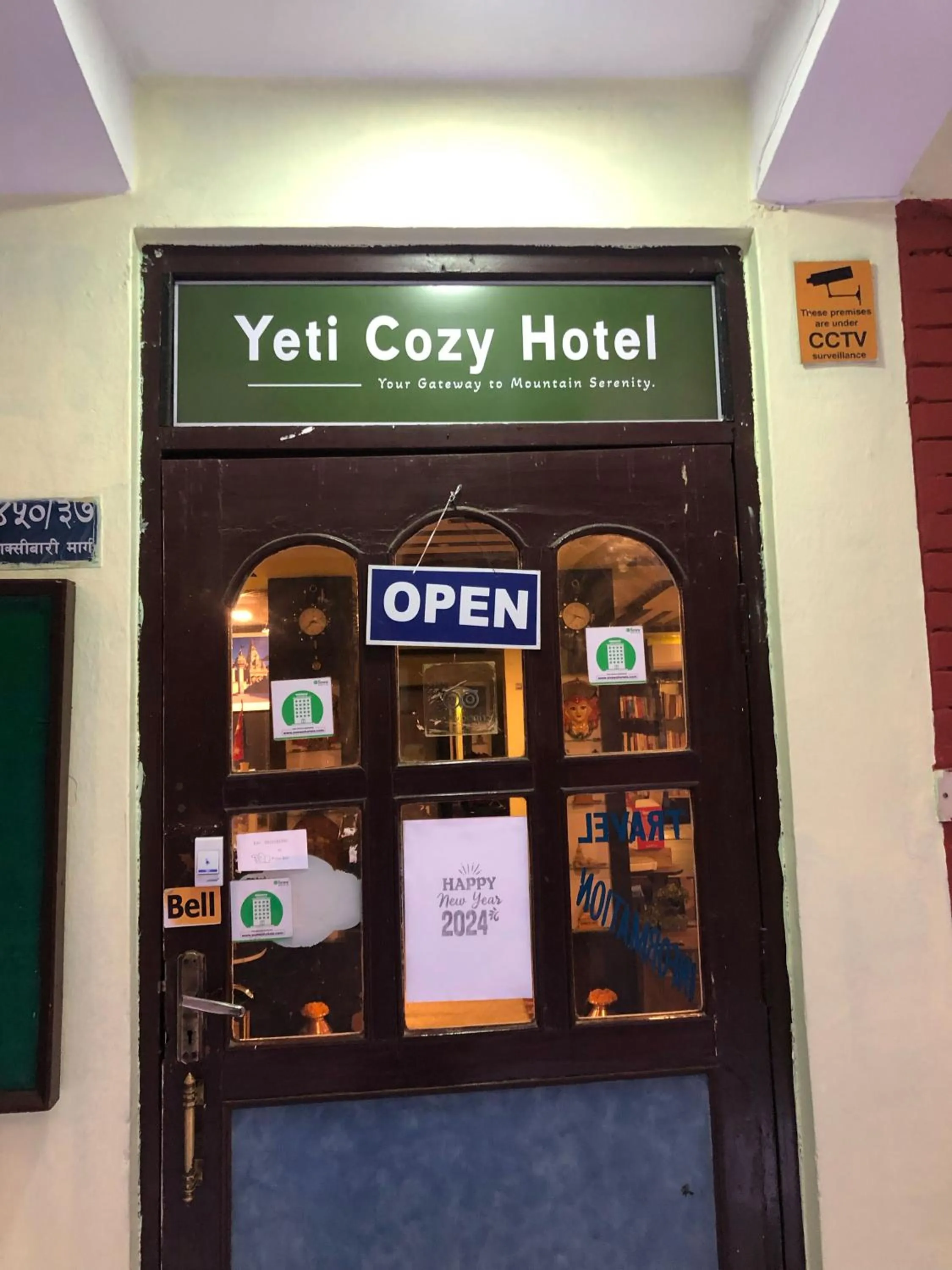 Property logo or sign in Yeti Cozy Hotel