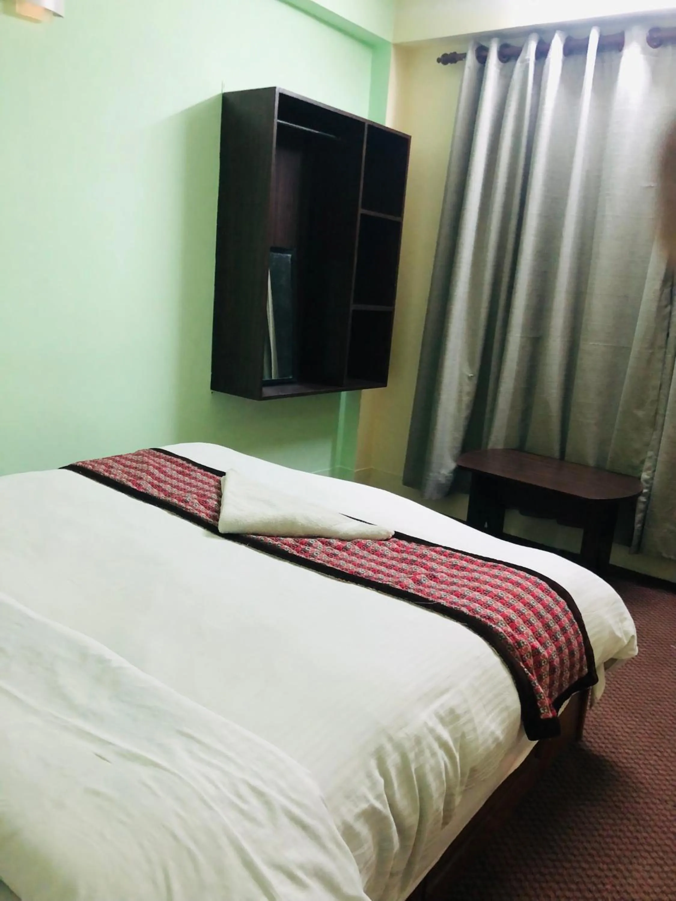 Bed in Yeti Cozy Hotel