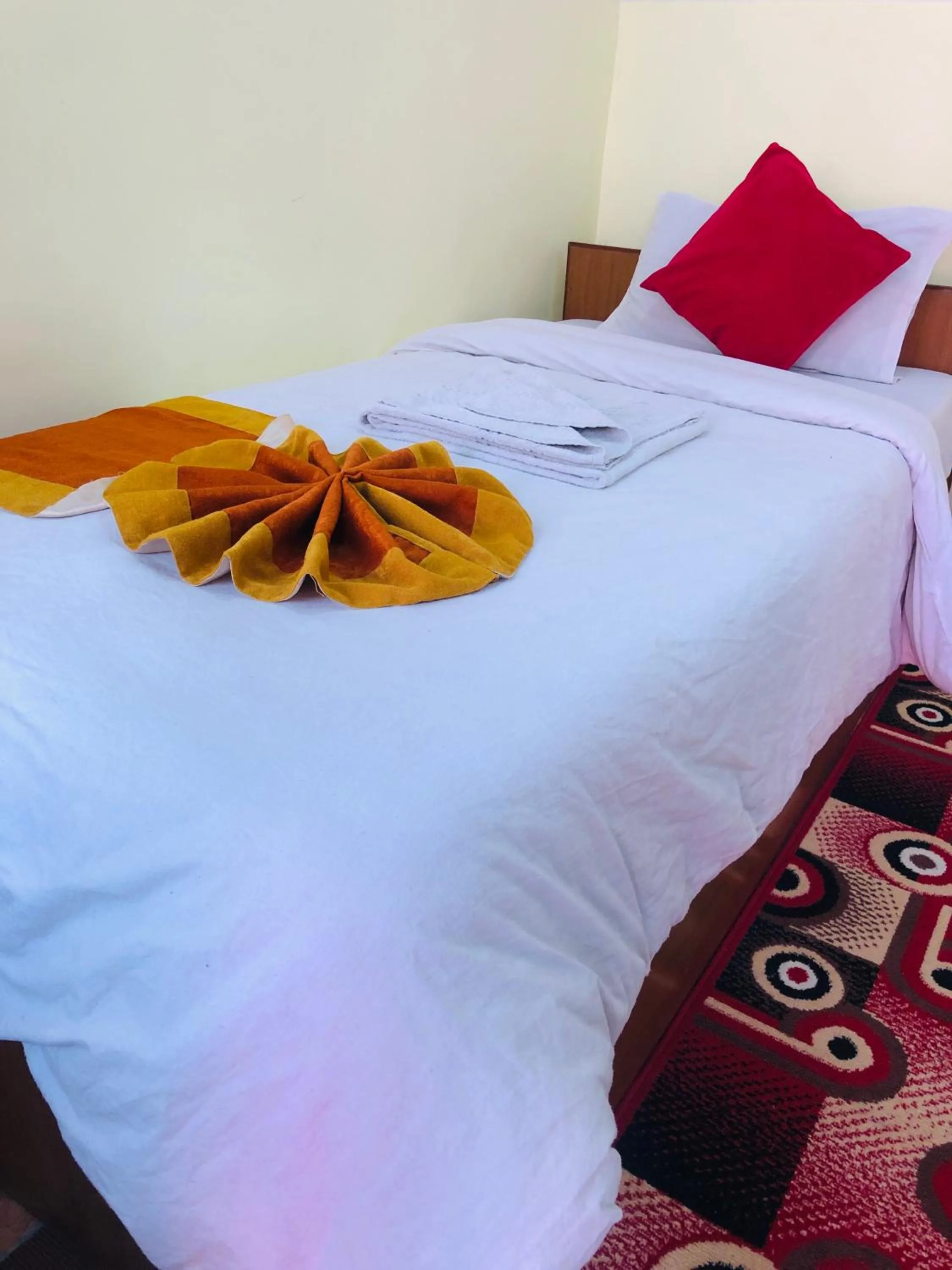 Bed in Yeti Cozy Hotel