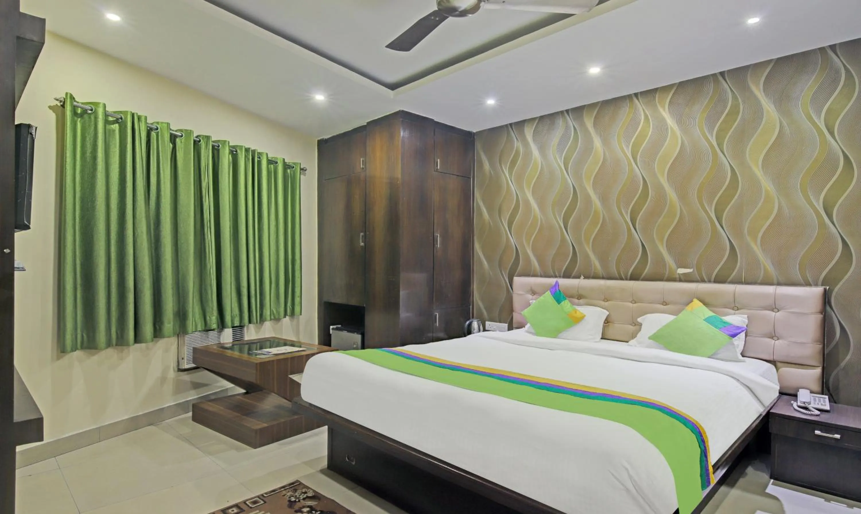 Bedroom, Bed in Treebo Archie Regency