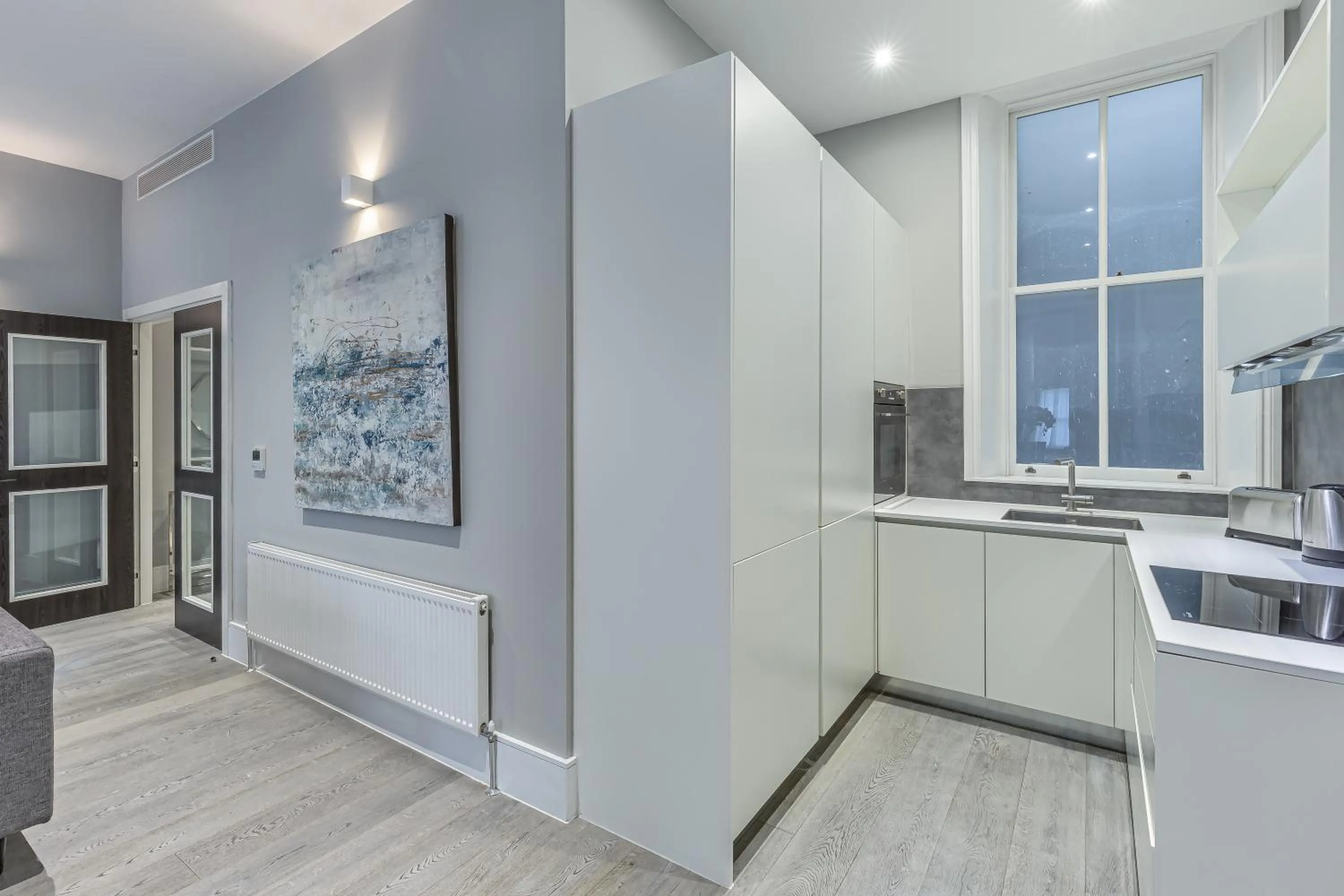 Kitchen or kitchenette in Green Street Residences by Aeria Apartments