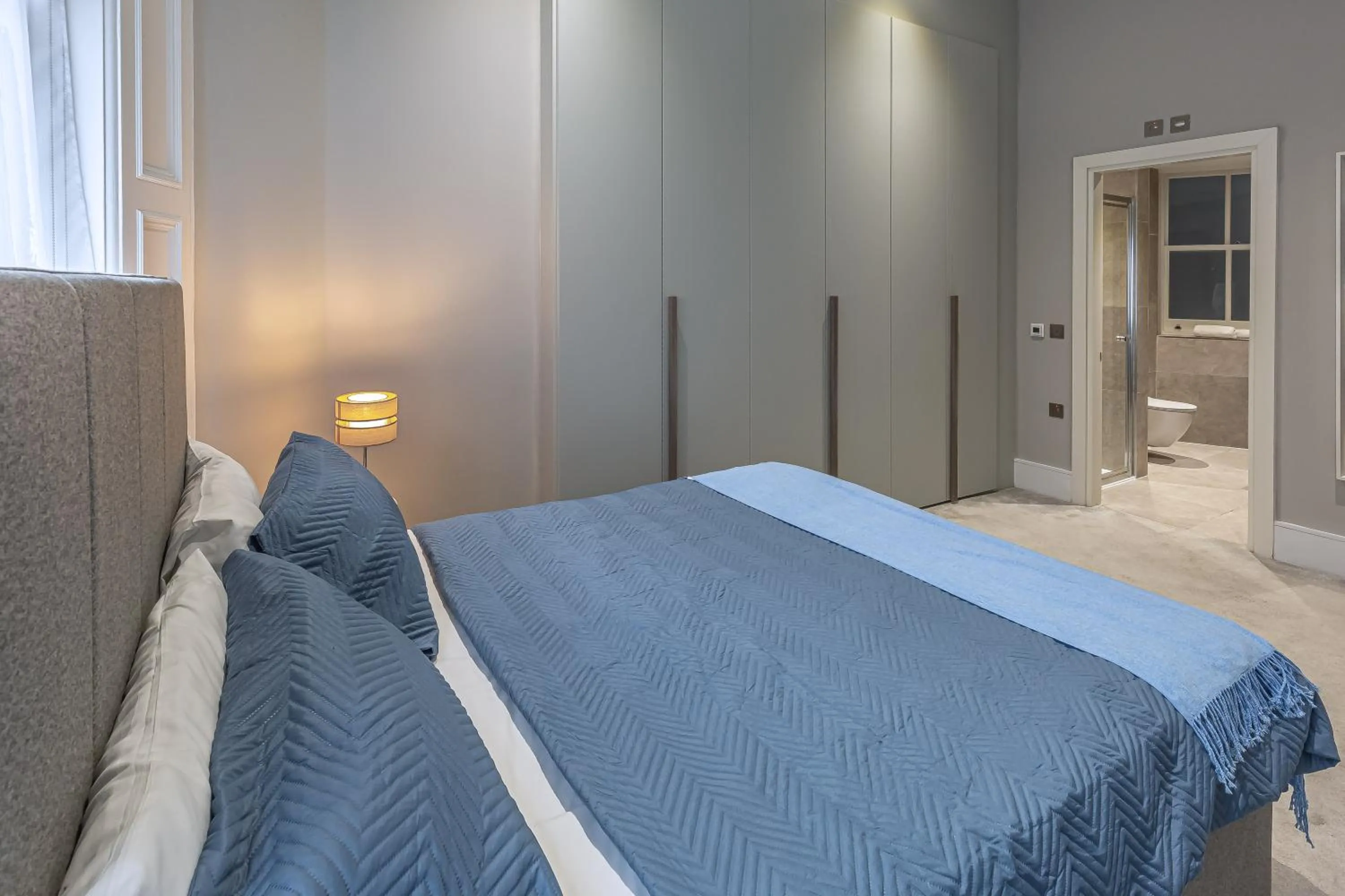Bedroom, Bed in Green Street Residences by Aeria Apartments