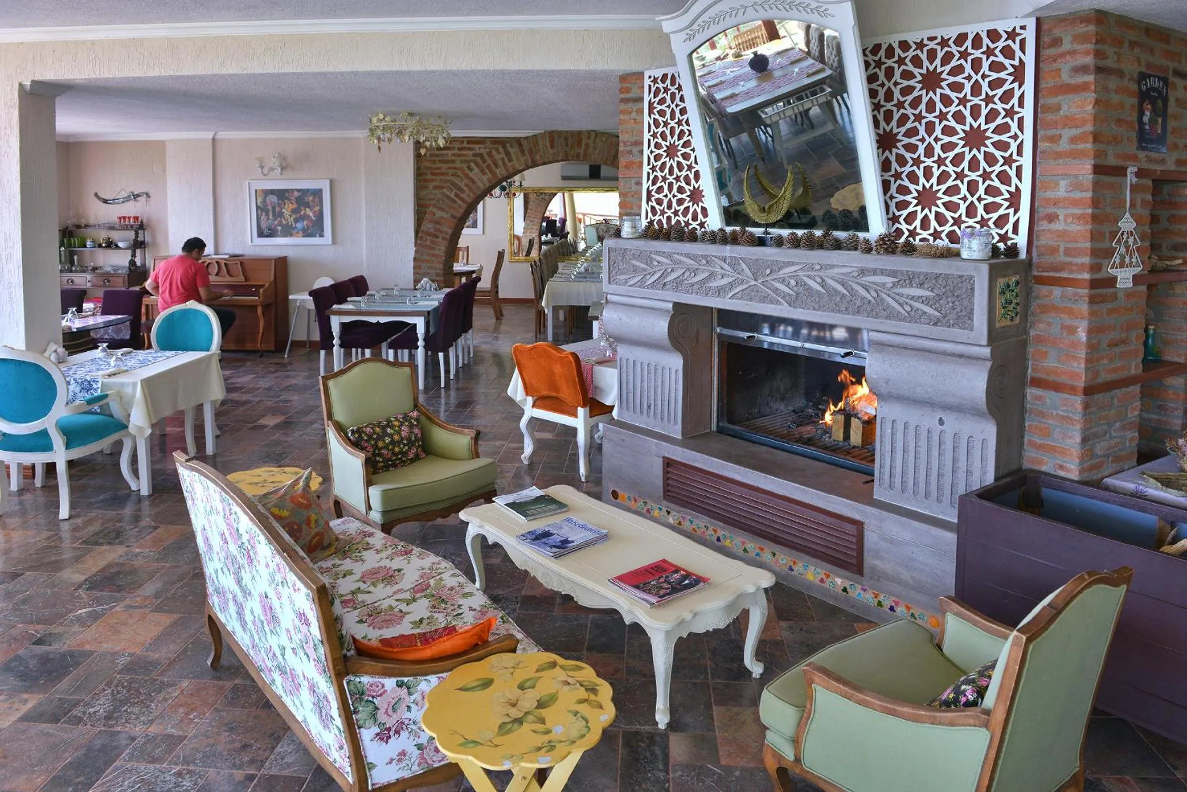 Communal lounge/ TV room in Aeneas Hotel