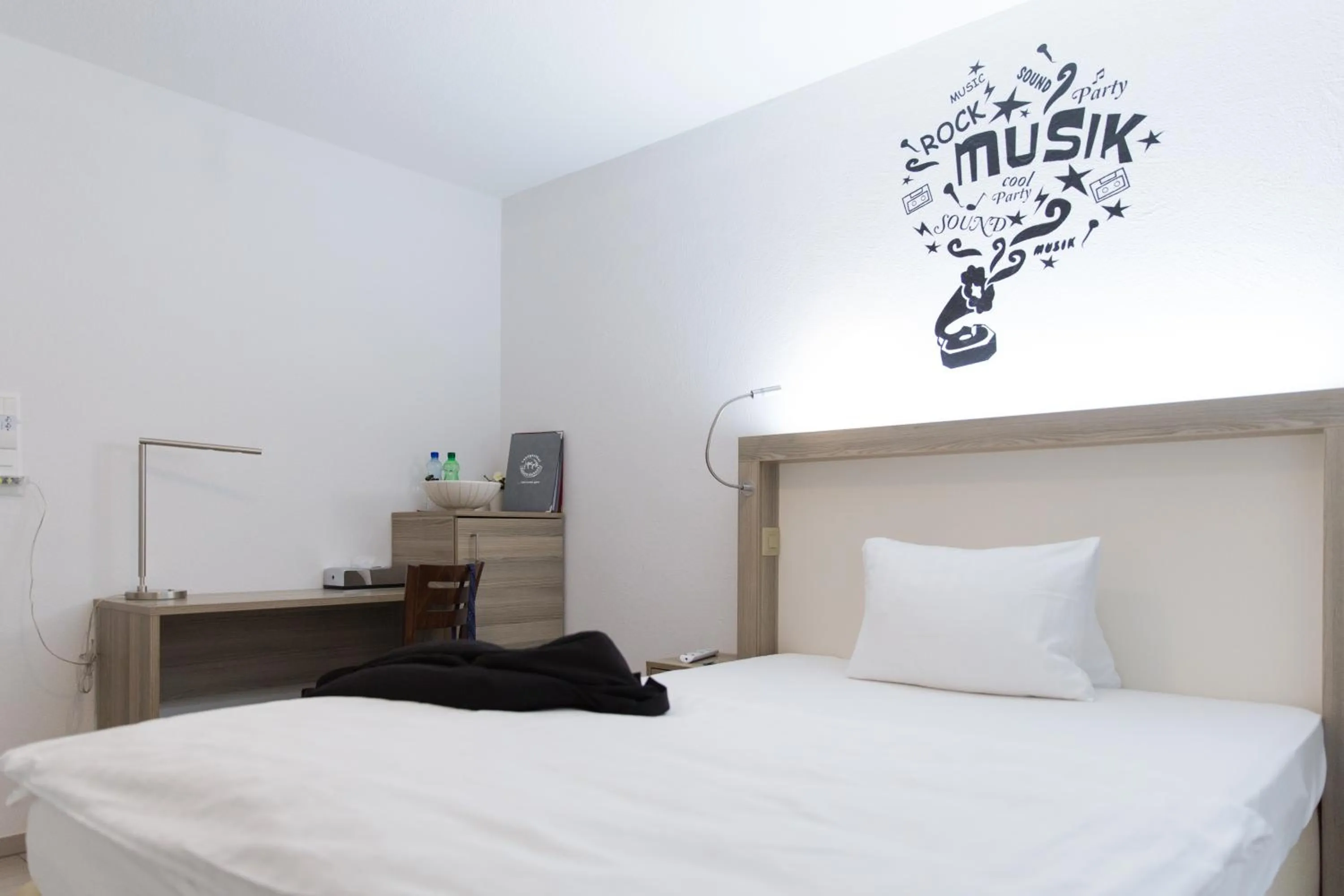 Photo of the whole room, Bed in Hotel Schäfli Siebnen