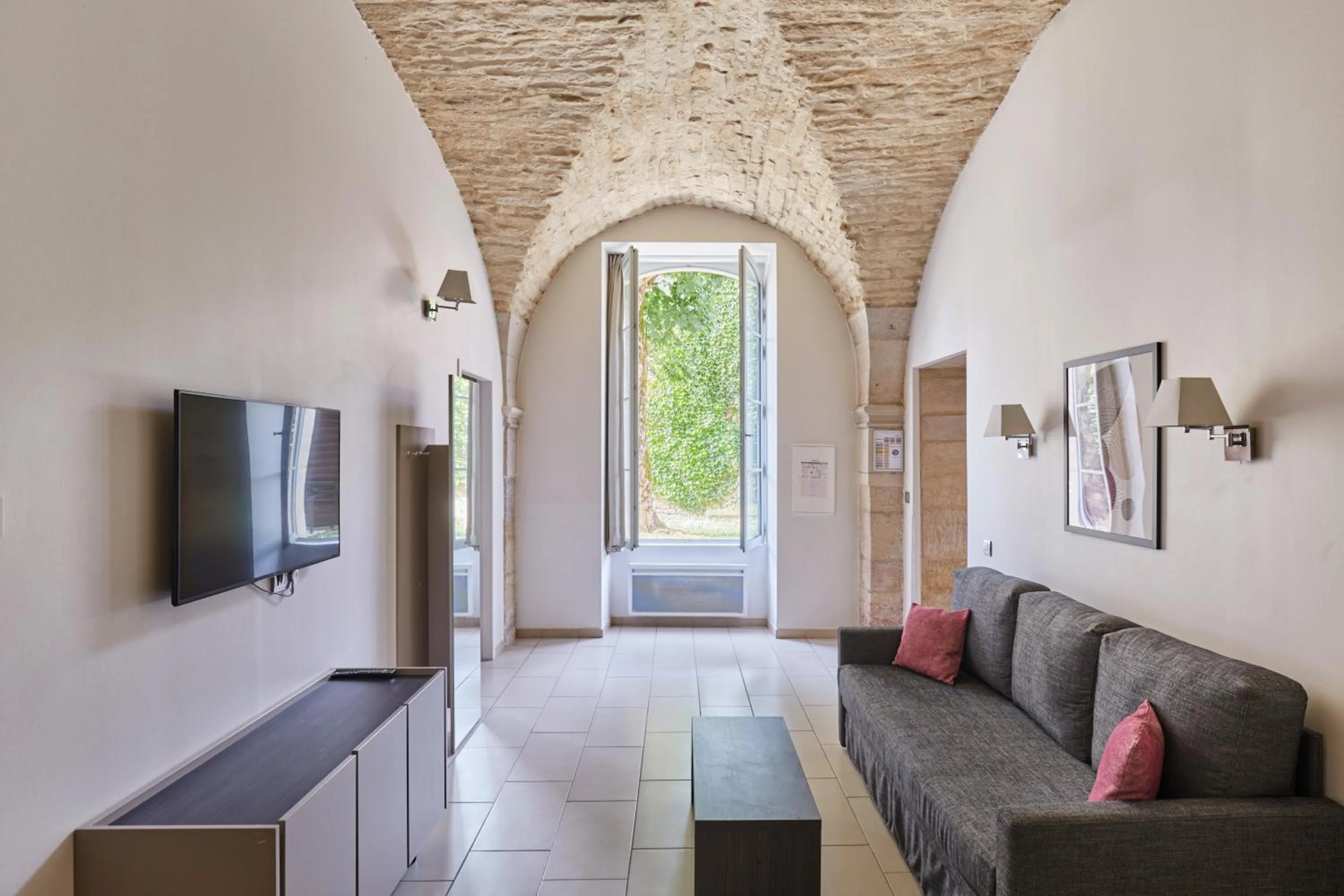 Seating area in Appart'hôtel Odalys City - Dijon Centre Les Cordeliers
