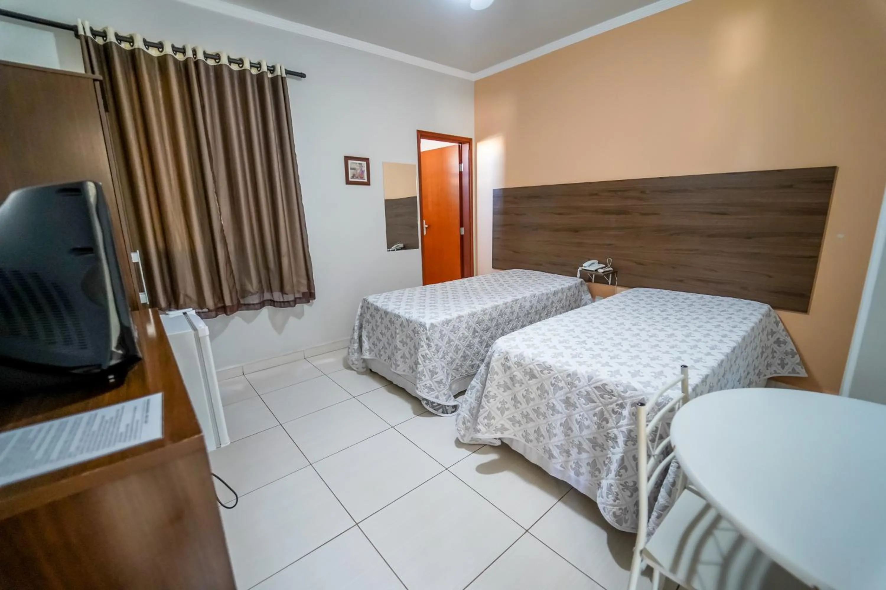 Photo of the whole room, Bed in Hotel Tadini