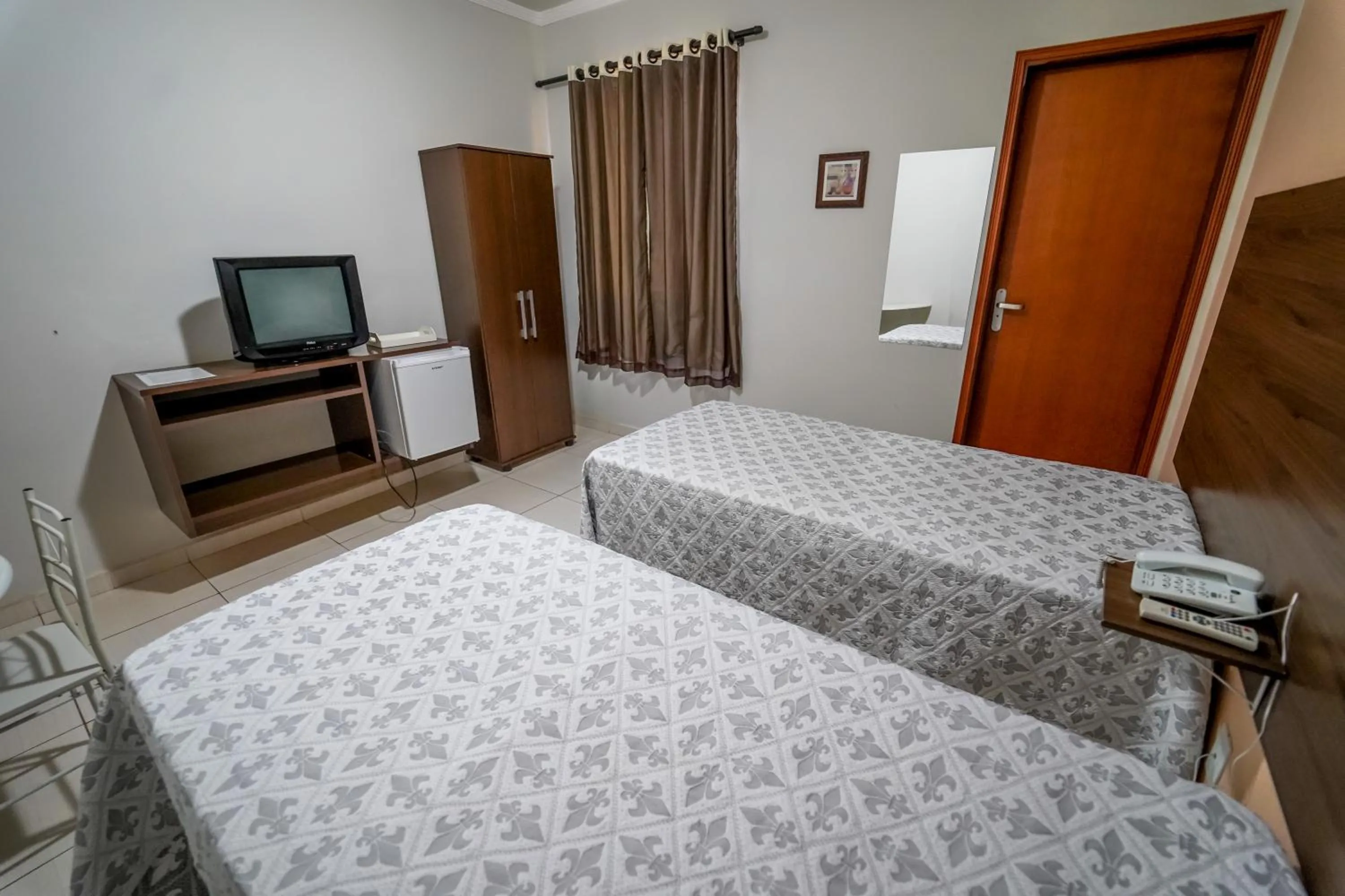 Photo of the whole room, Bed in Hotel Tadini