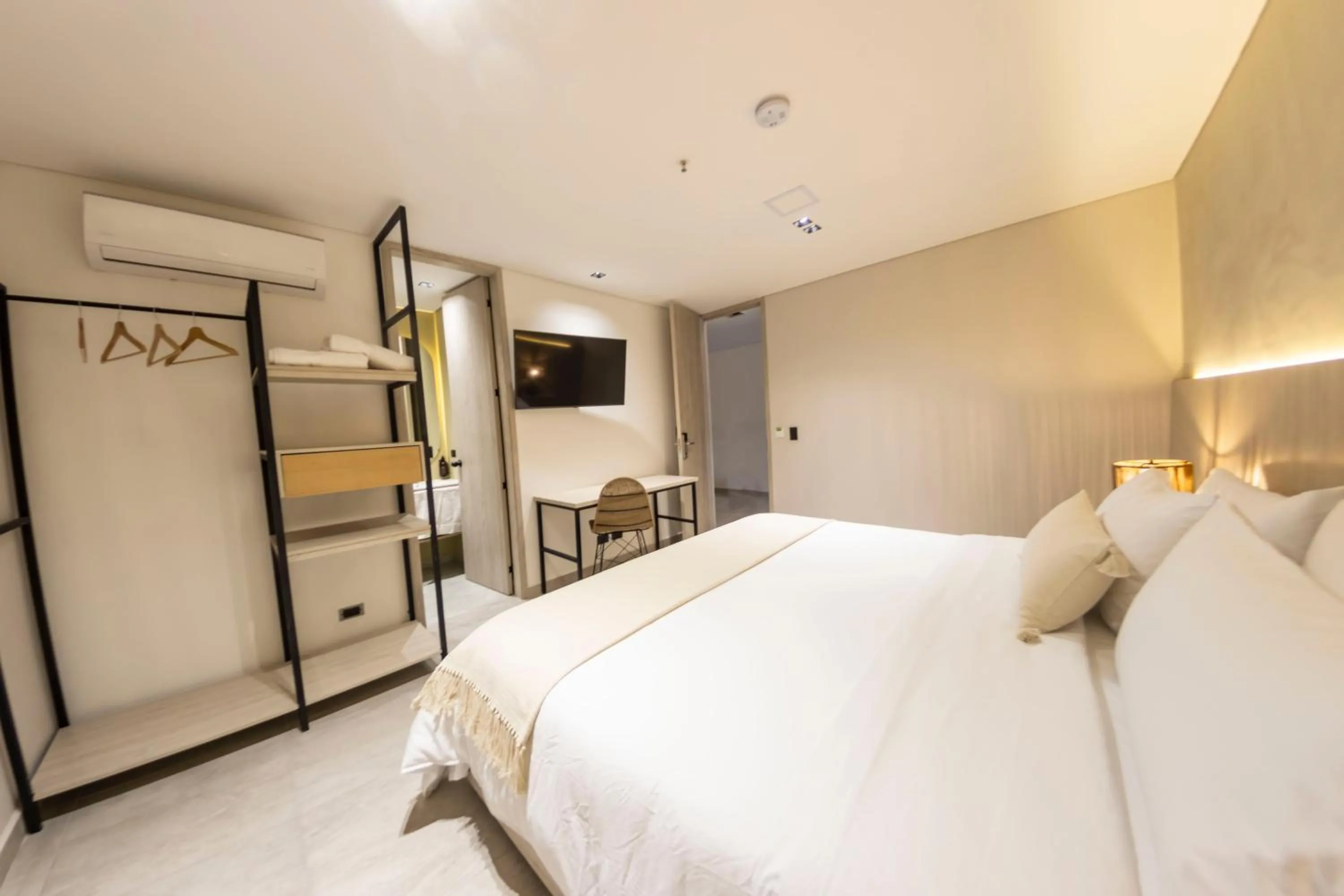 Bed in Sonata 44 Hotel Laureles