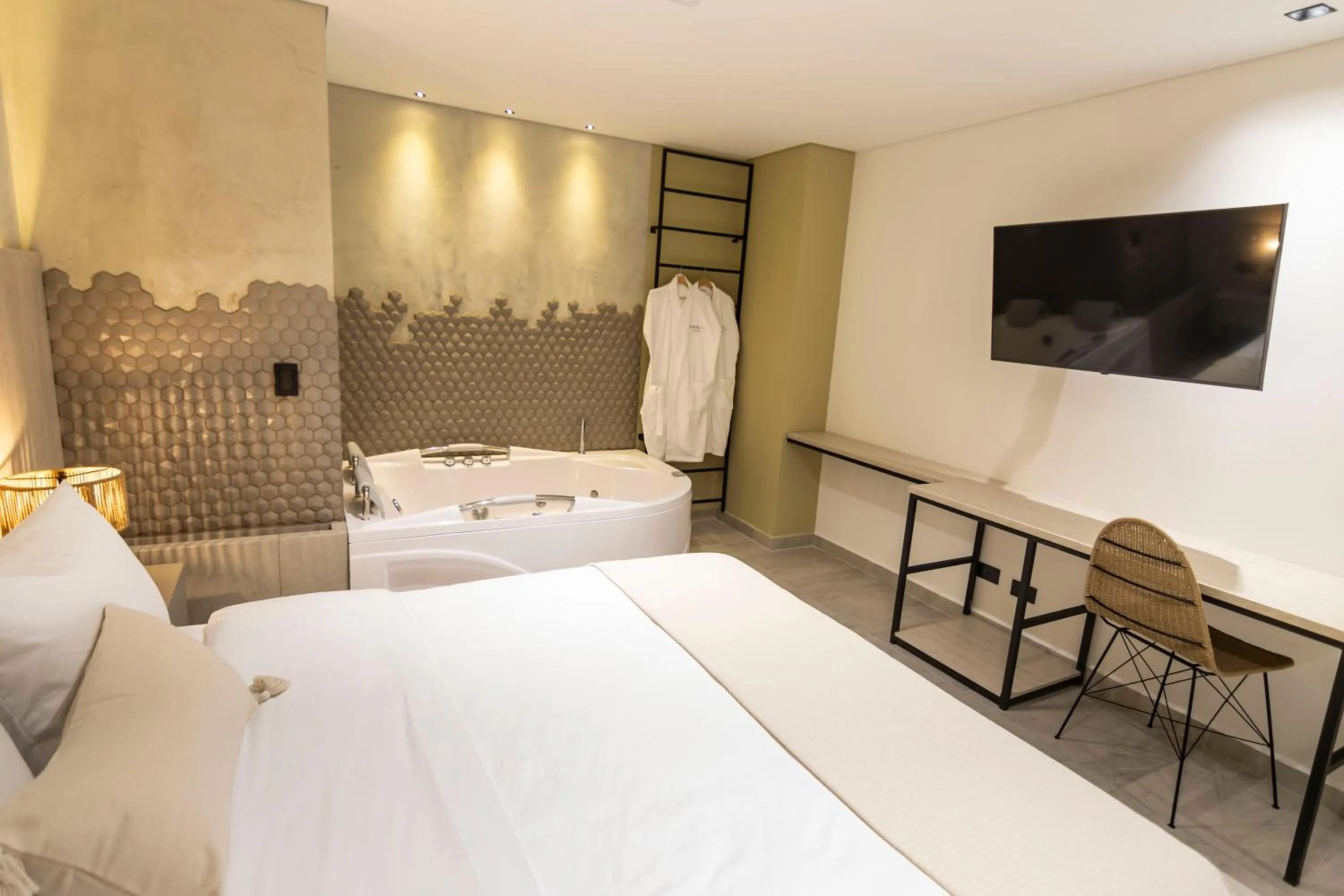 Bed in Sonata 44 Hotel Laureles