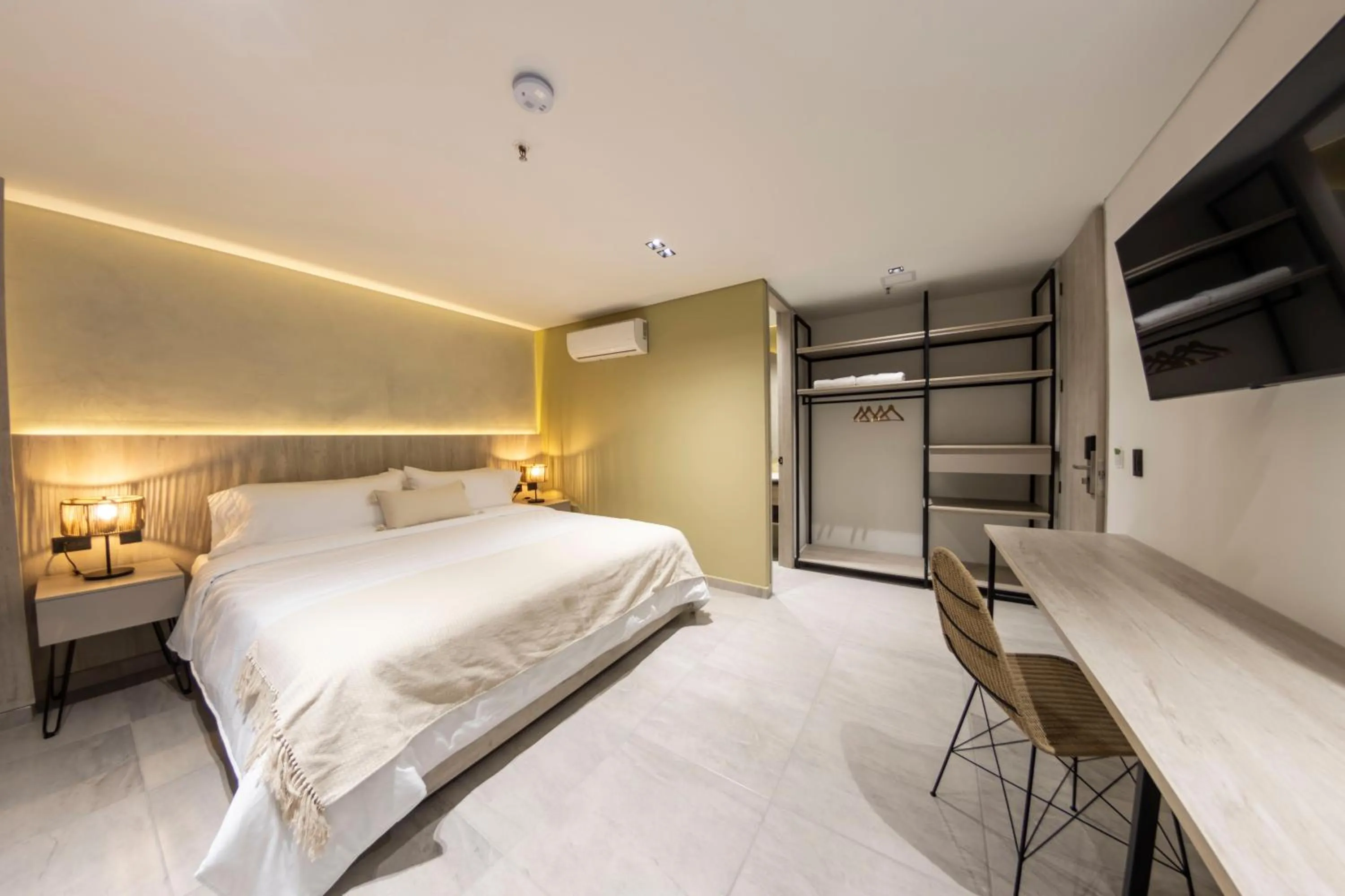 Bed in Sonata 44 Hotel Laureles