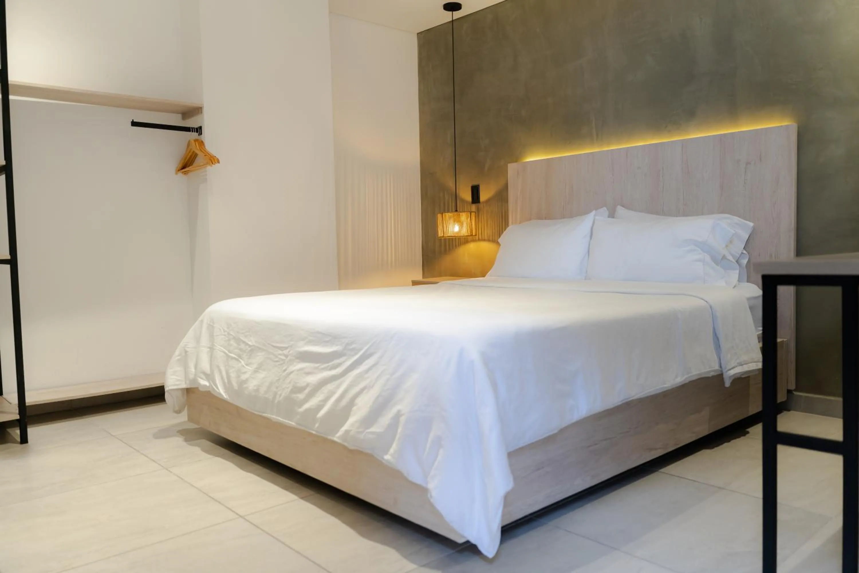 Bed in Sonata 44 Hotel Laureles