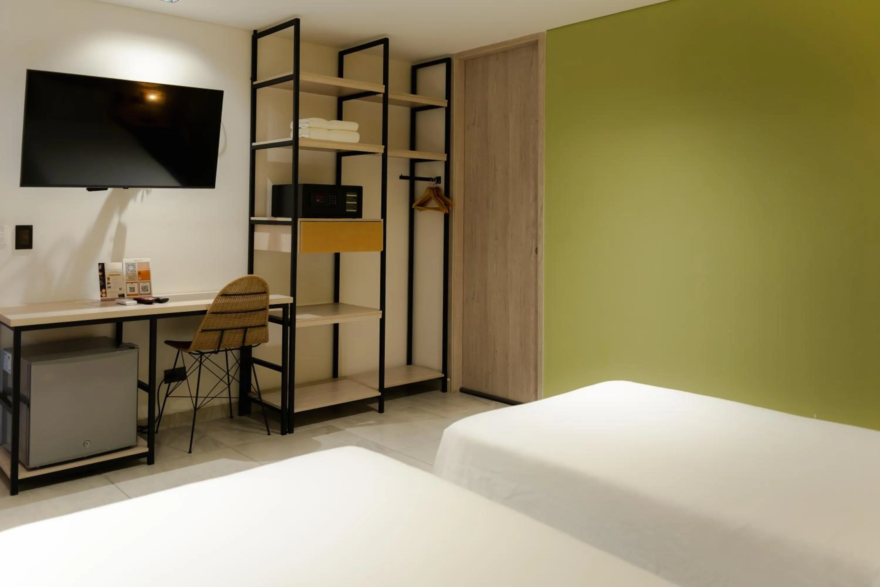 Bed in Sonata 44 Hotel Laureles