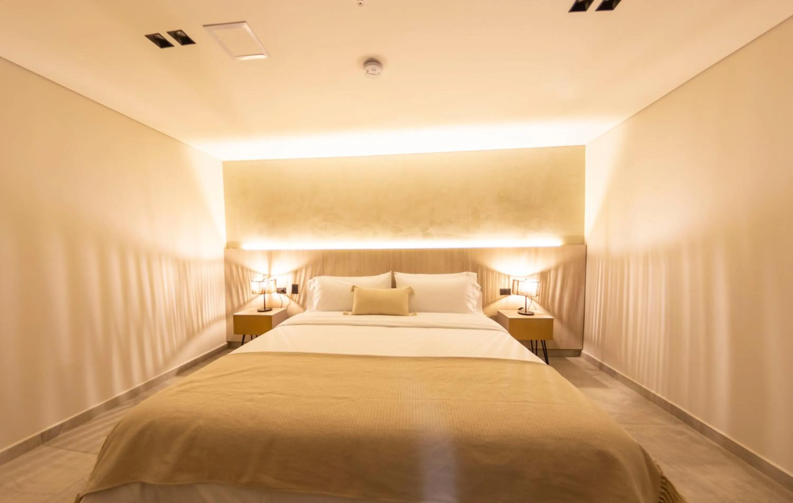 Bed in Sonata 44 Hotel Laureles