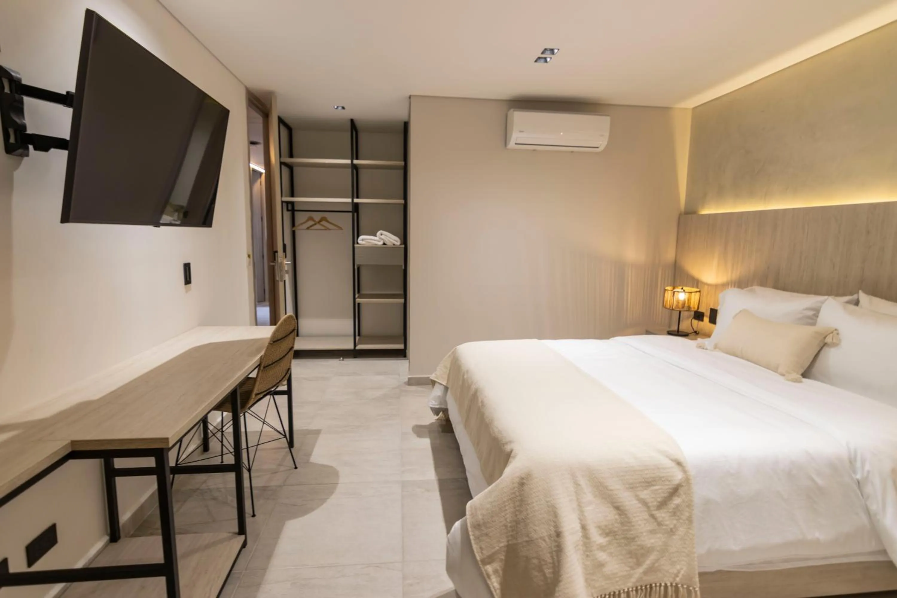 Bed in Sonata 44 Hotel Laureles