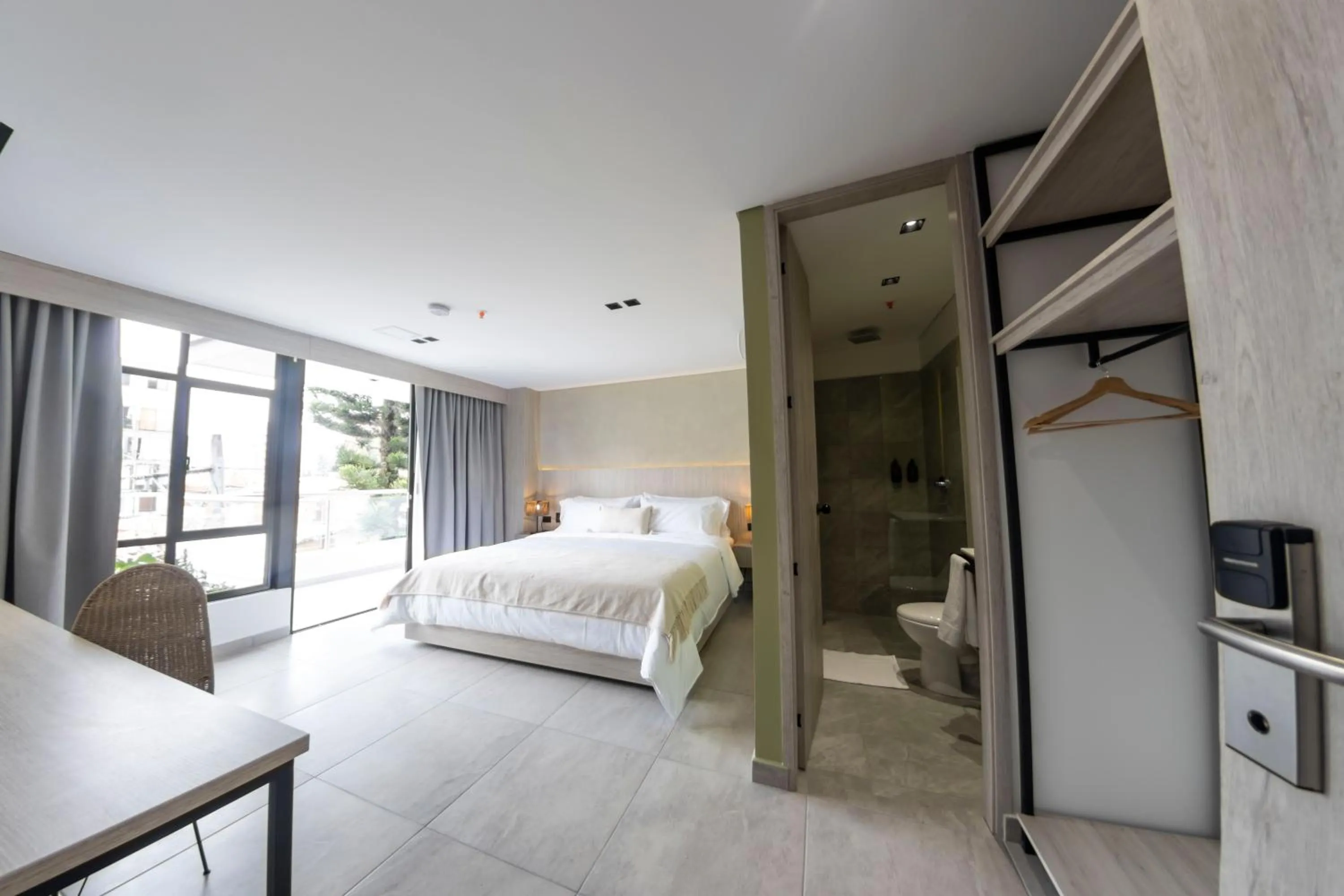 Bed in Sonata 44 Hotel Laureles