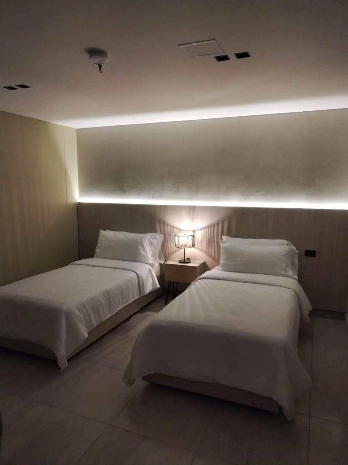 Bed in Sonata 44 Hotel Laureles