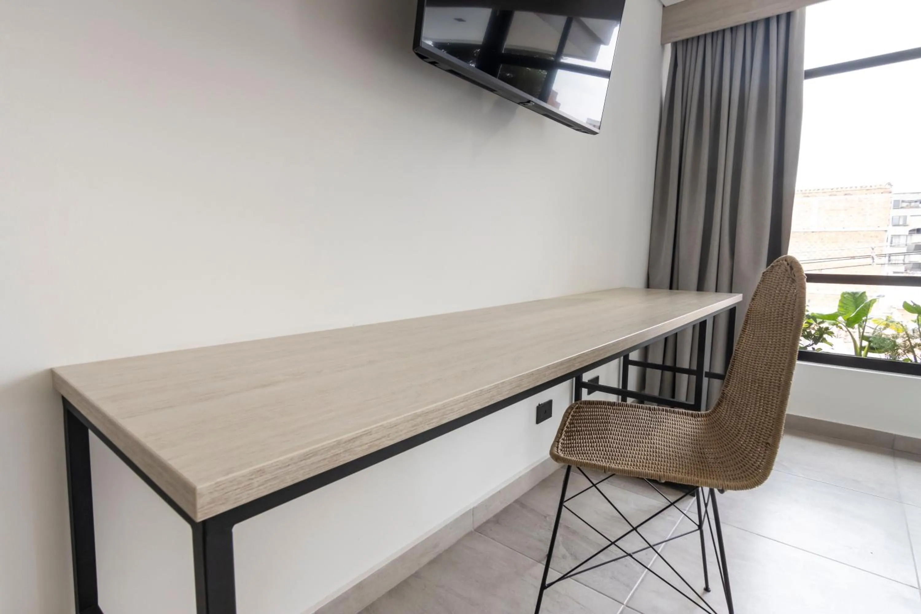 TV and multimedia in Sonata 44 Hotel Laureles