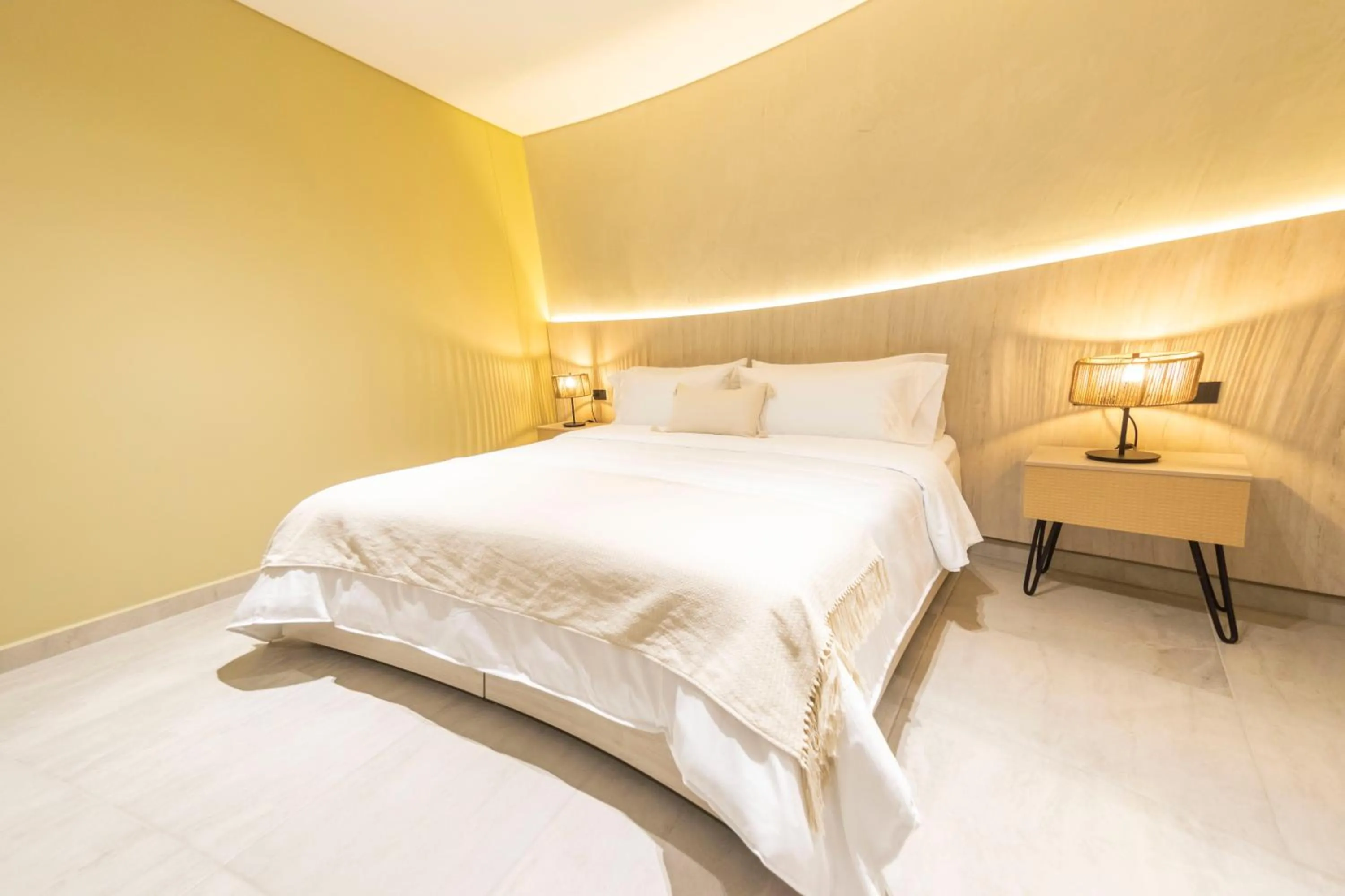 Bed in Sonata 44 Hotel Laureles