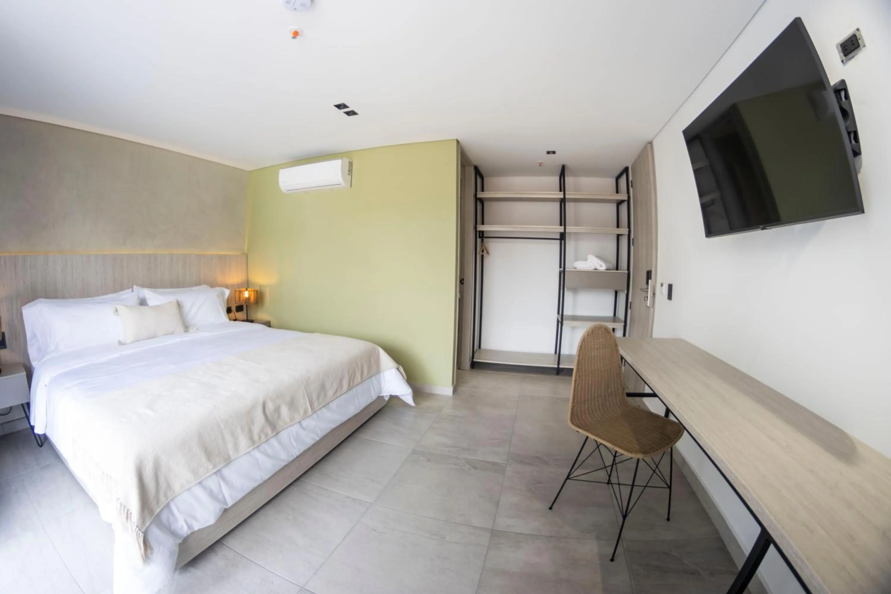 Bed in Sonata 44 Hotel Laureles