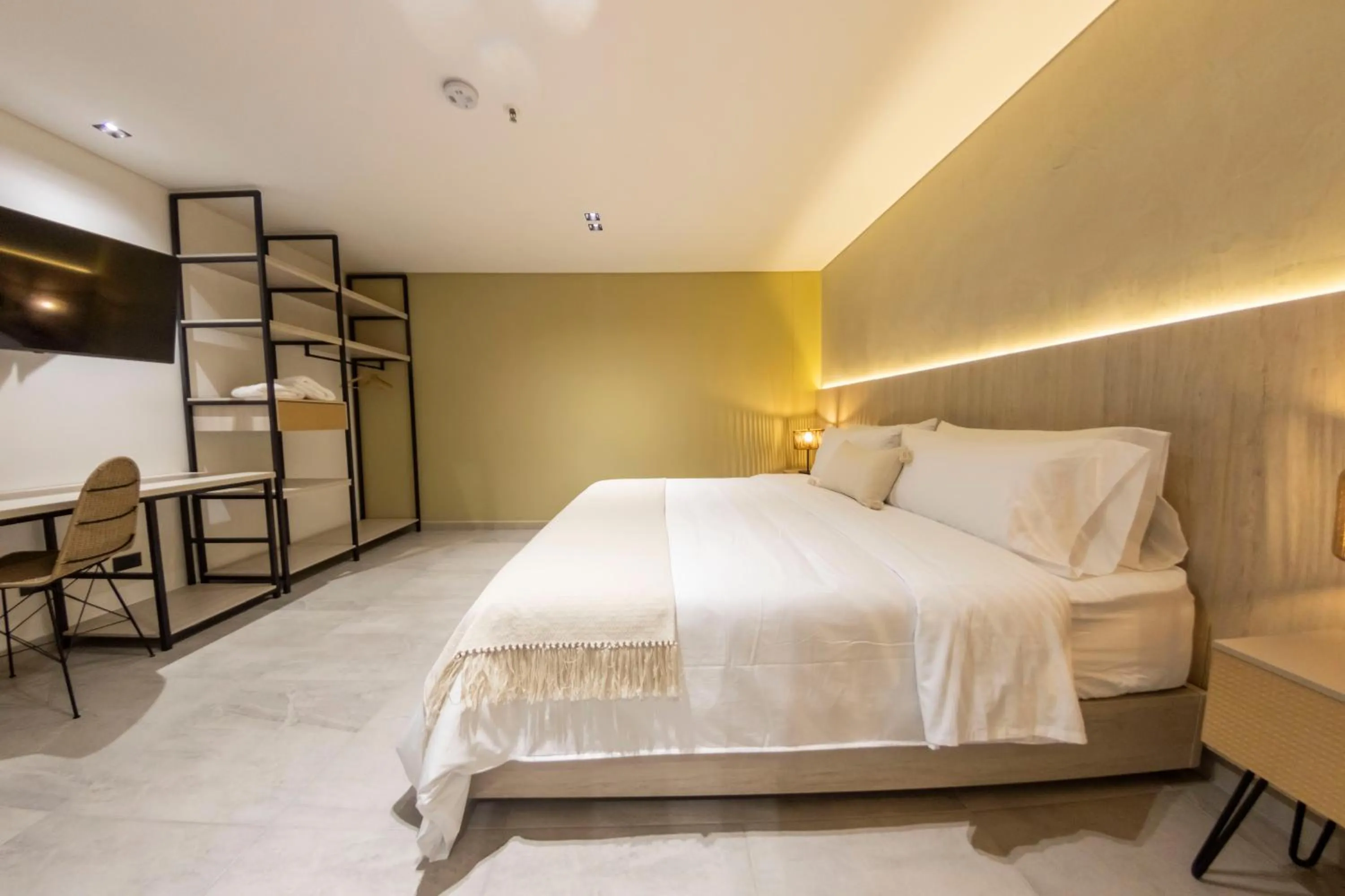 Bed in Sonata 44 Hotel Laureles