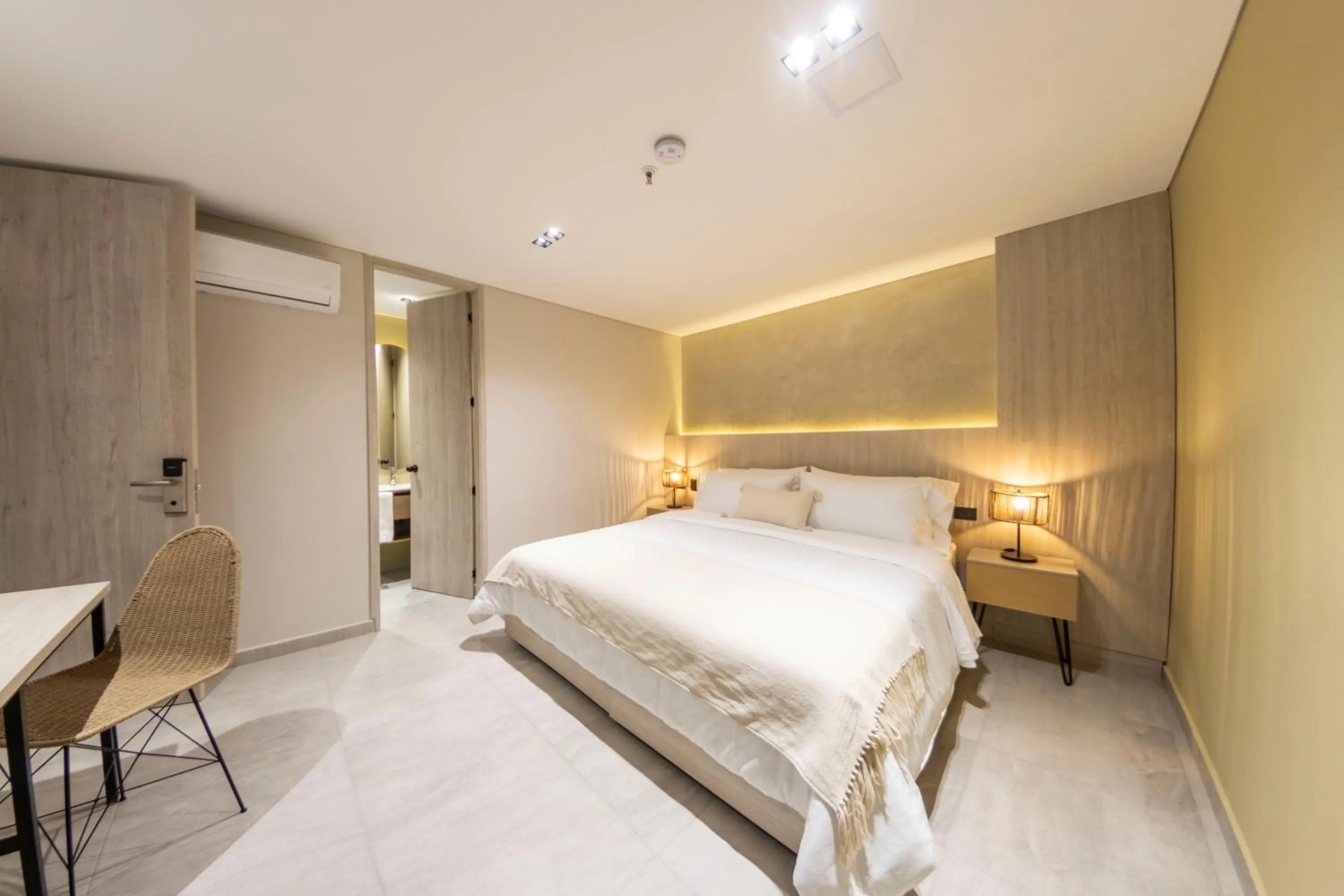 Bed in Sonata 44 Hotel Laureles