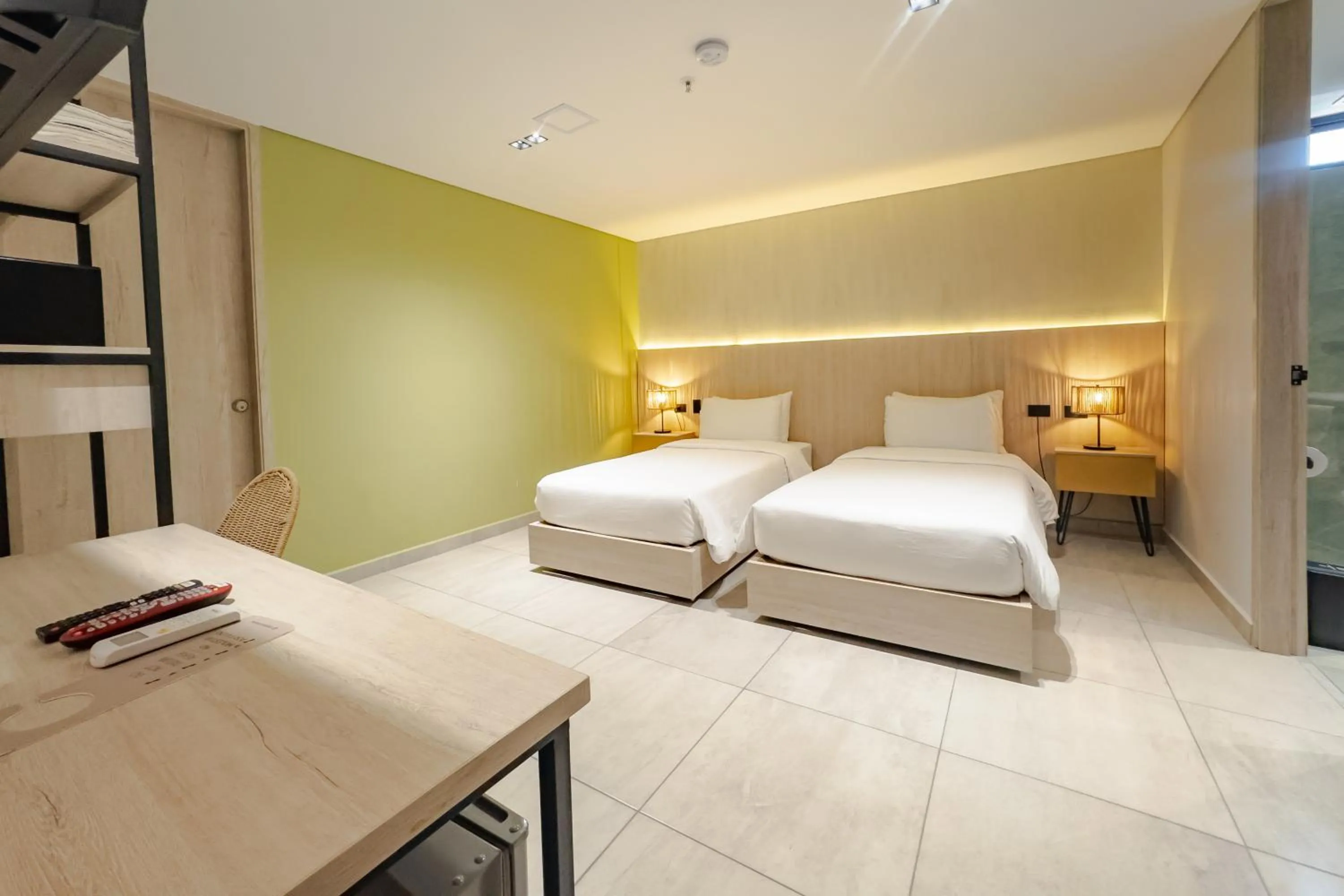 Bed in Sonata 44 Hotel Laureles