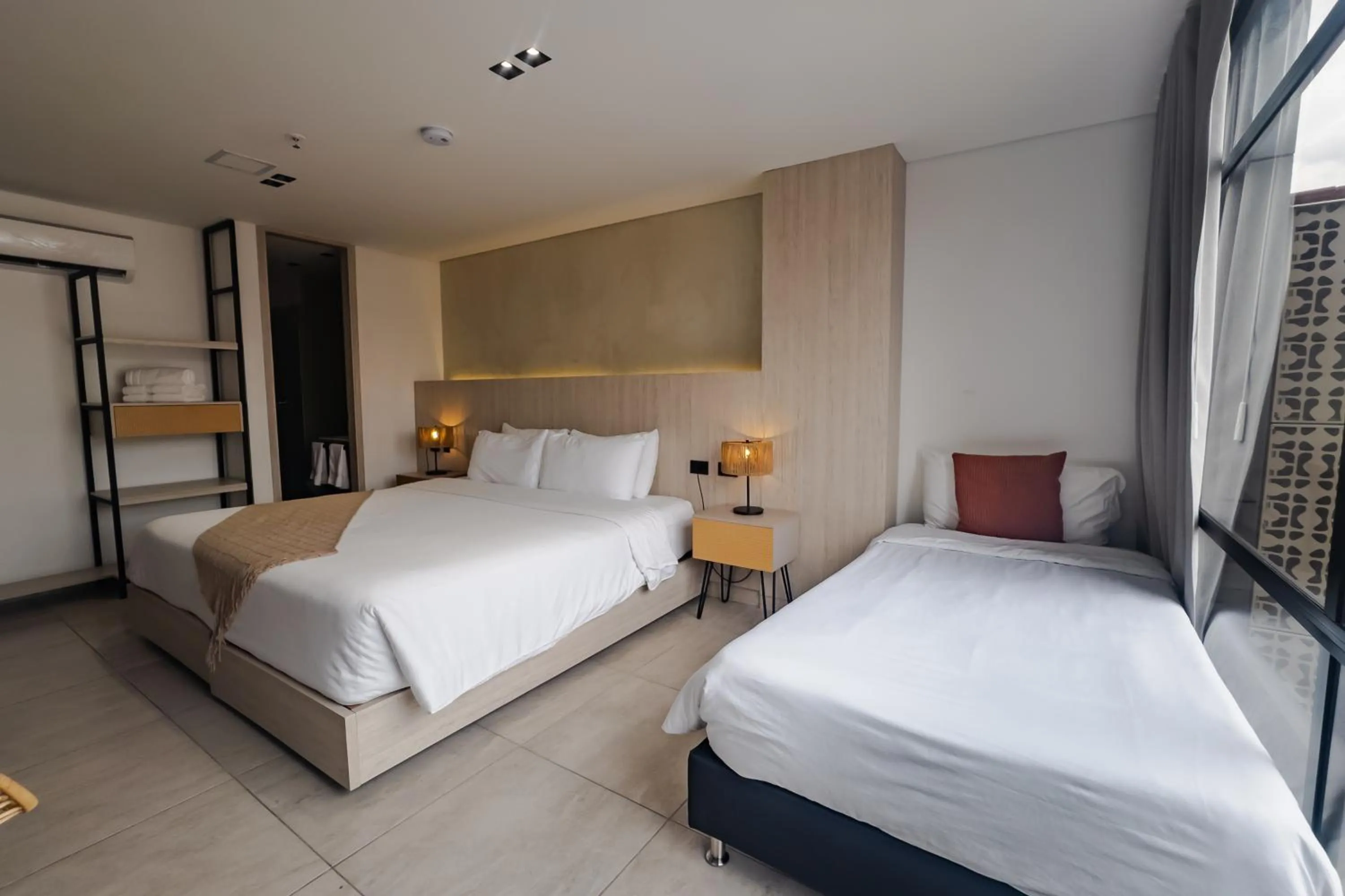 Bed in Sonata 44 Hotel Laureles